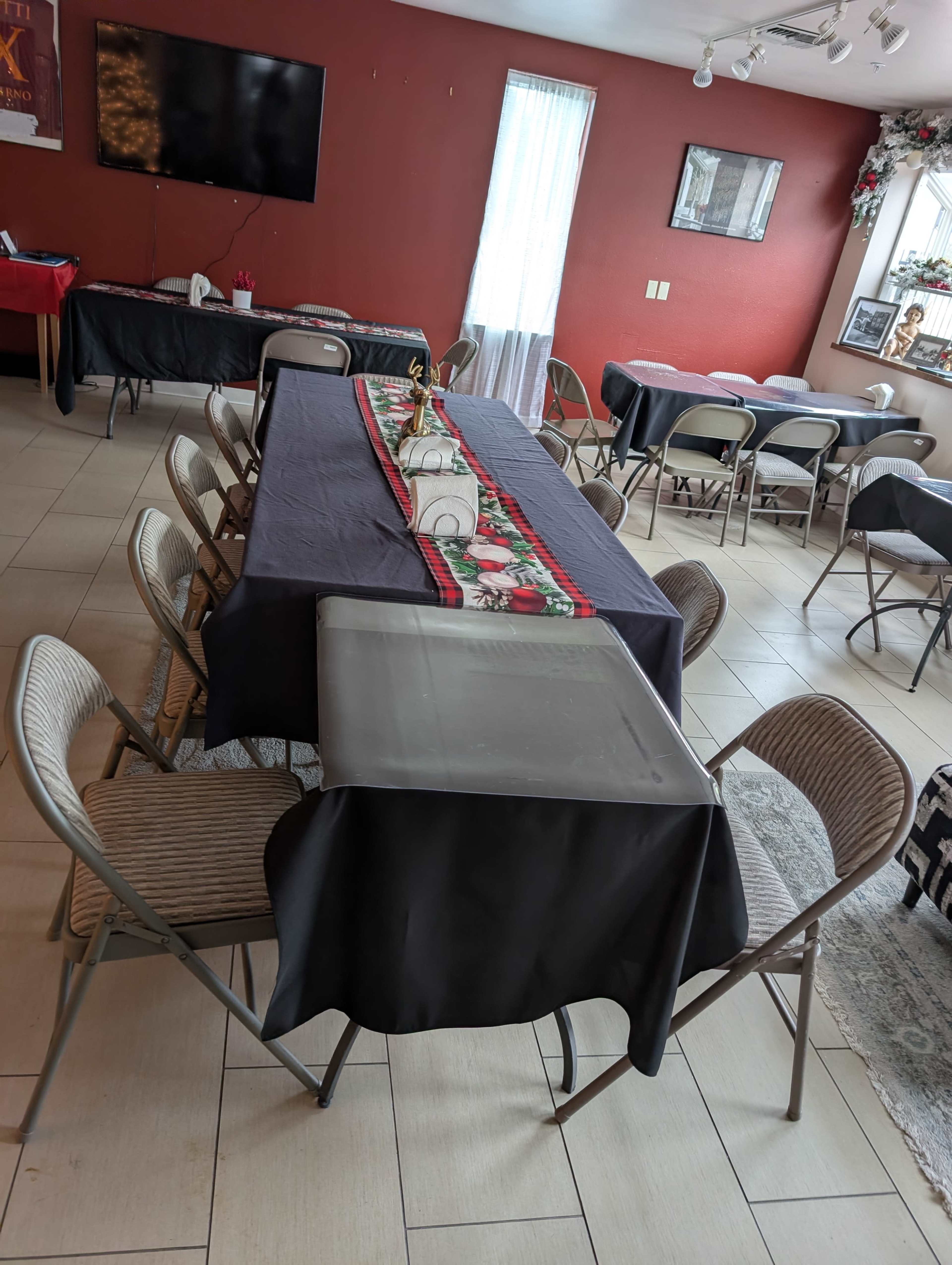 Cozy Caffe meeting room with couch and large screen tv Image in Evansville, Burien, WA