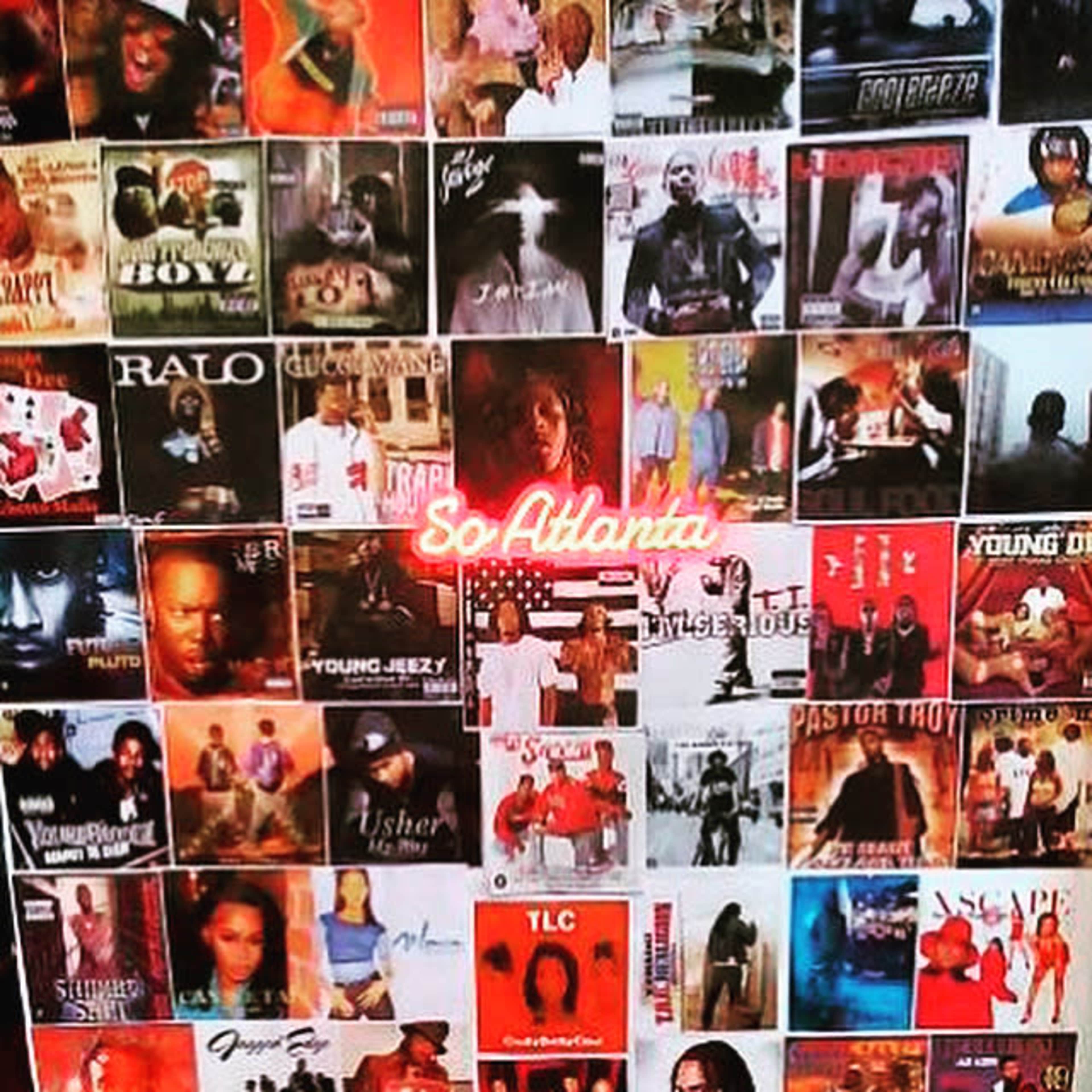 The image features a collage of various album covers arranged on a wall, showcasing a range of hip-hop and R&B artists with the words "So Atlanta" illuminated in the center.