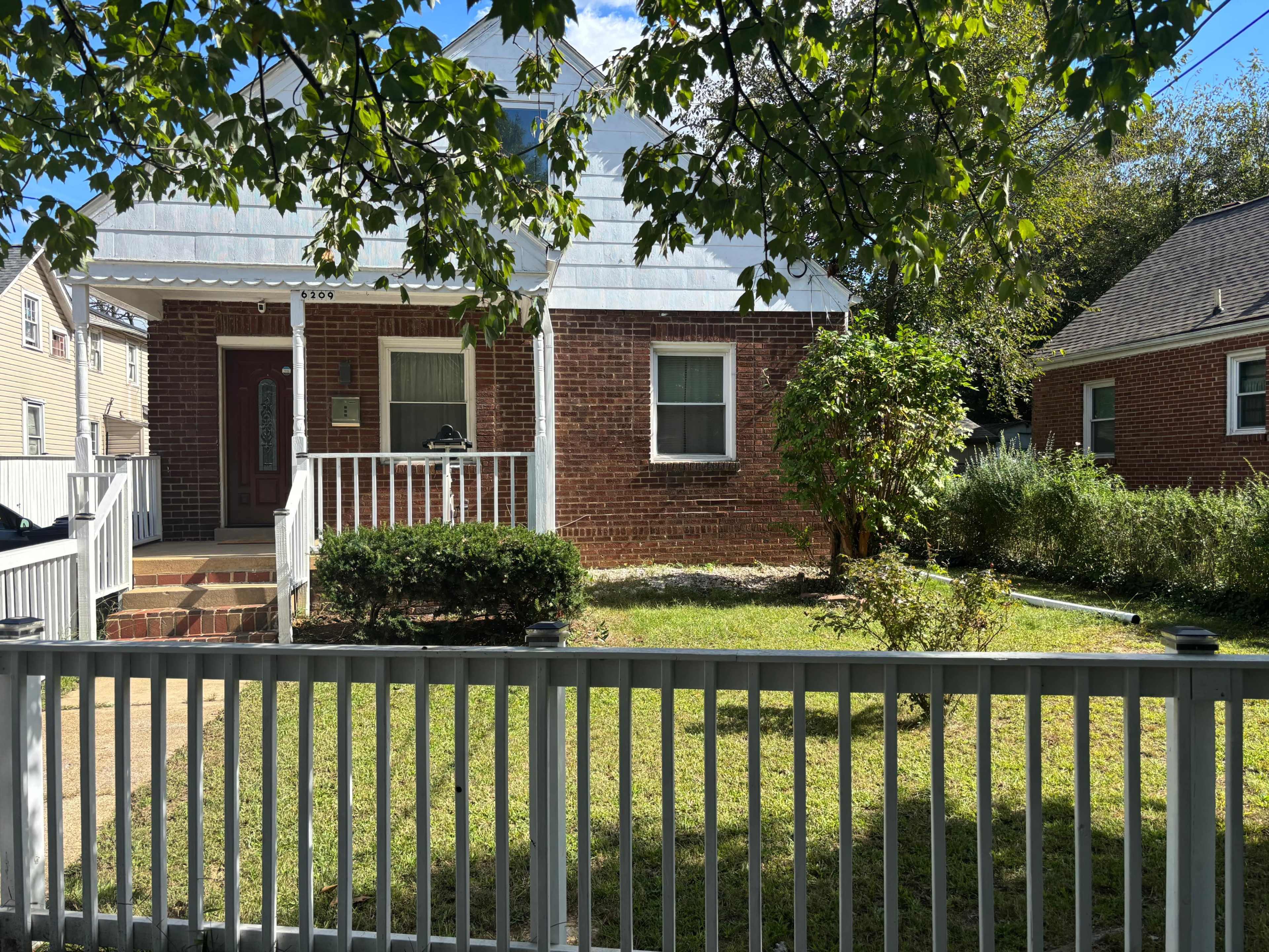 Urban and Artsy Open Floor Living Room and Kitchen Space with Great Natural light Image in Riverdale Park, Riverdale, MD