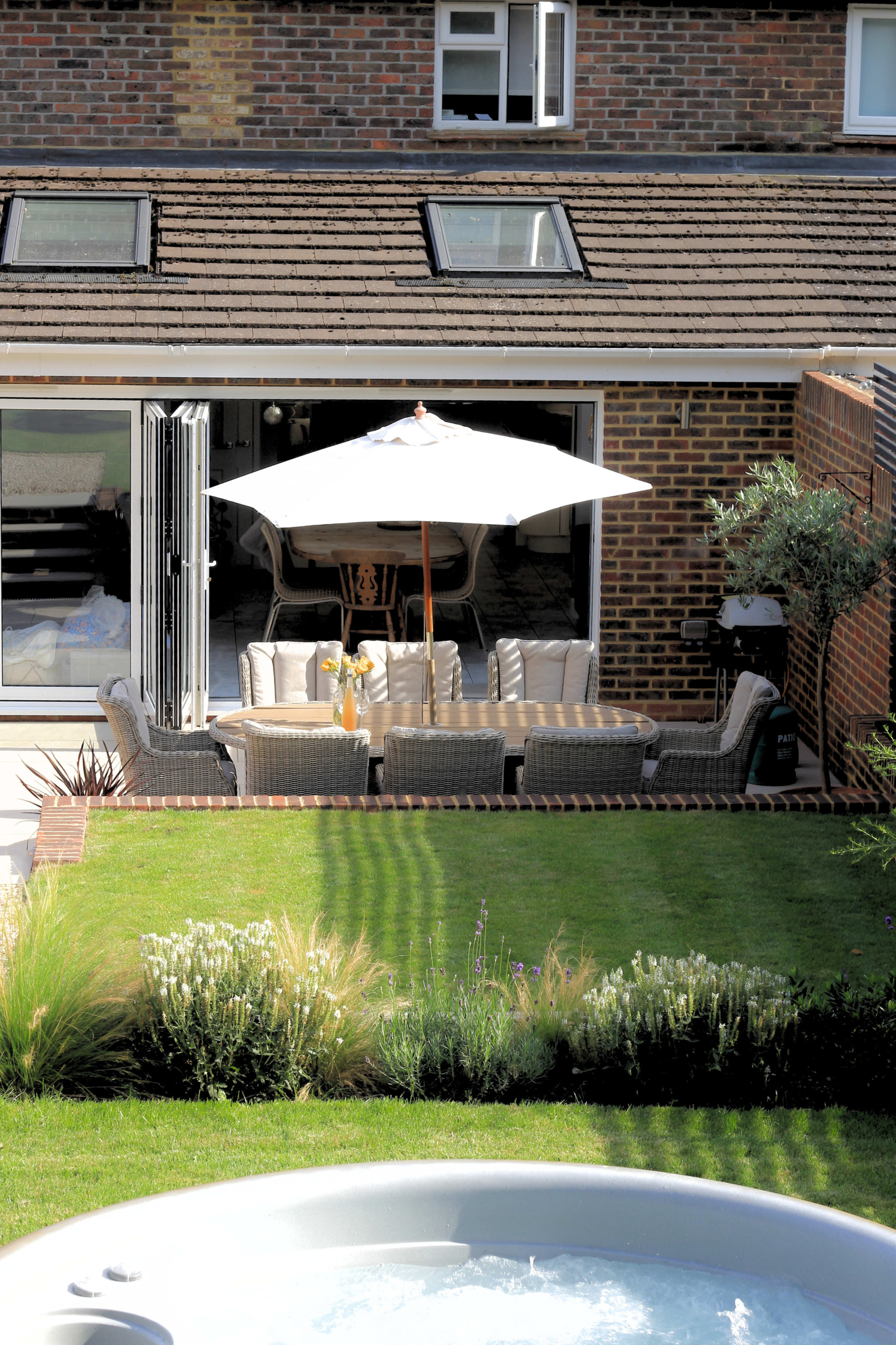 Modern Home with Stylish Interior and Lush Landscaped Garden Image in Farnham, Farnham, ENG