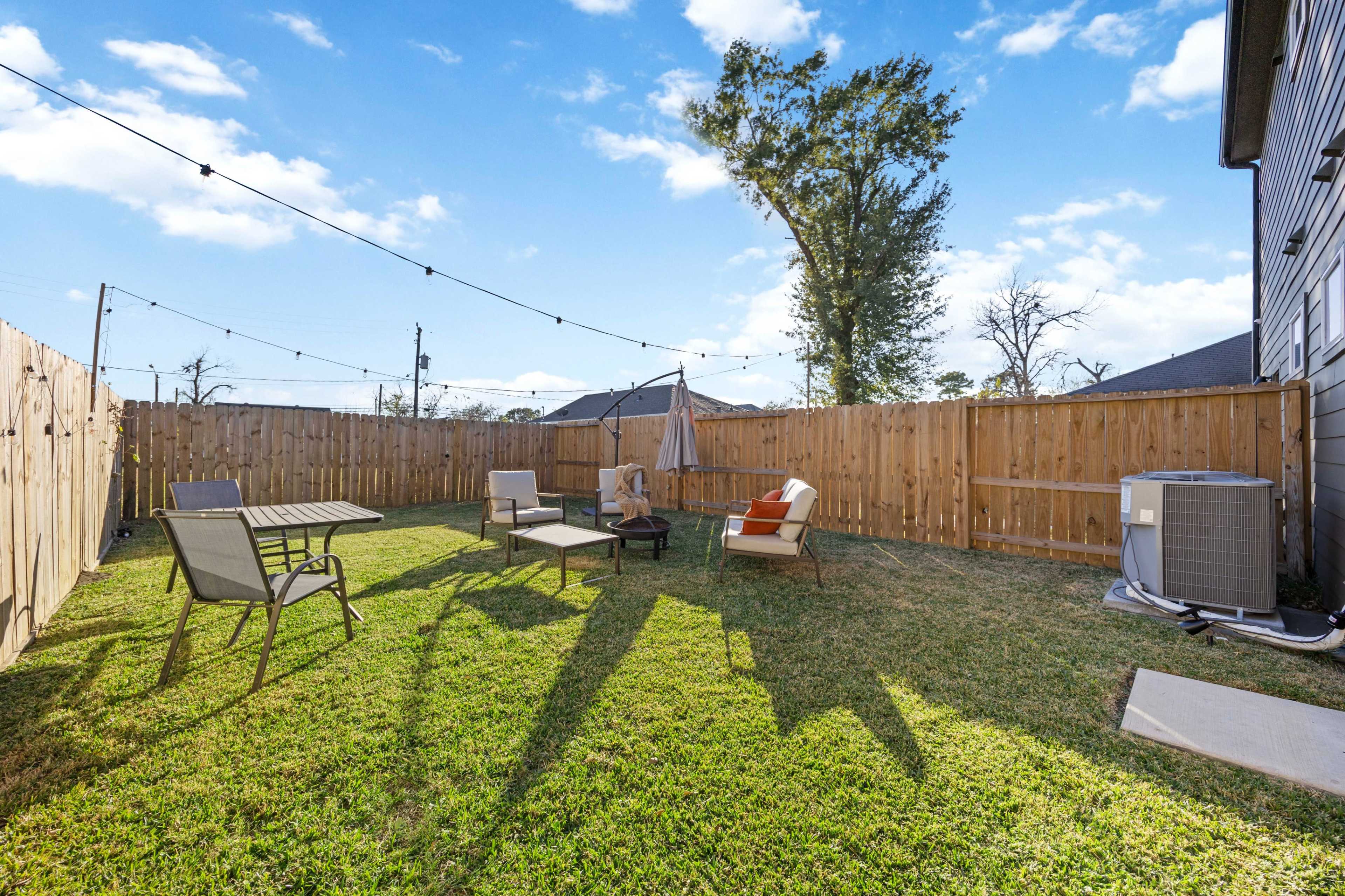 Fully Fenced Urban Upscale Backyard Romantic String light Space Image in Greater Fifth Ward, Houston, TX