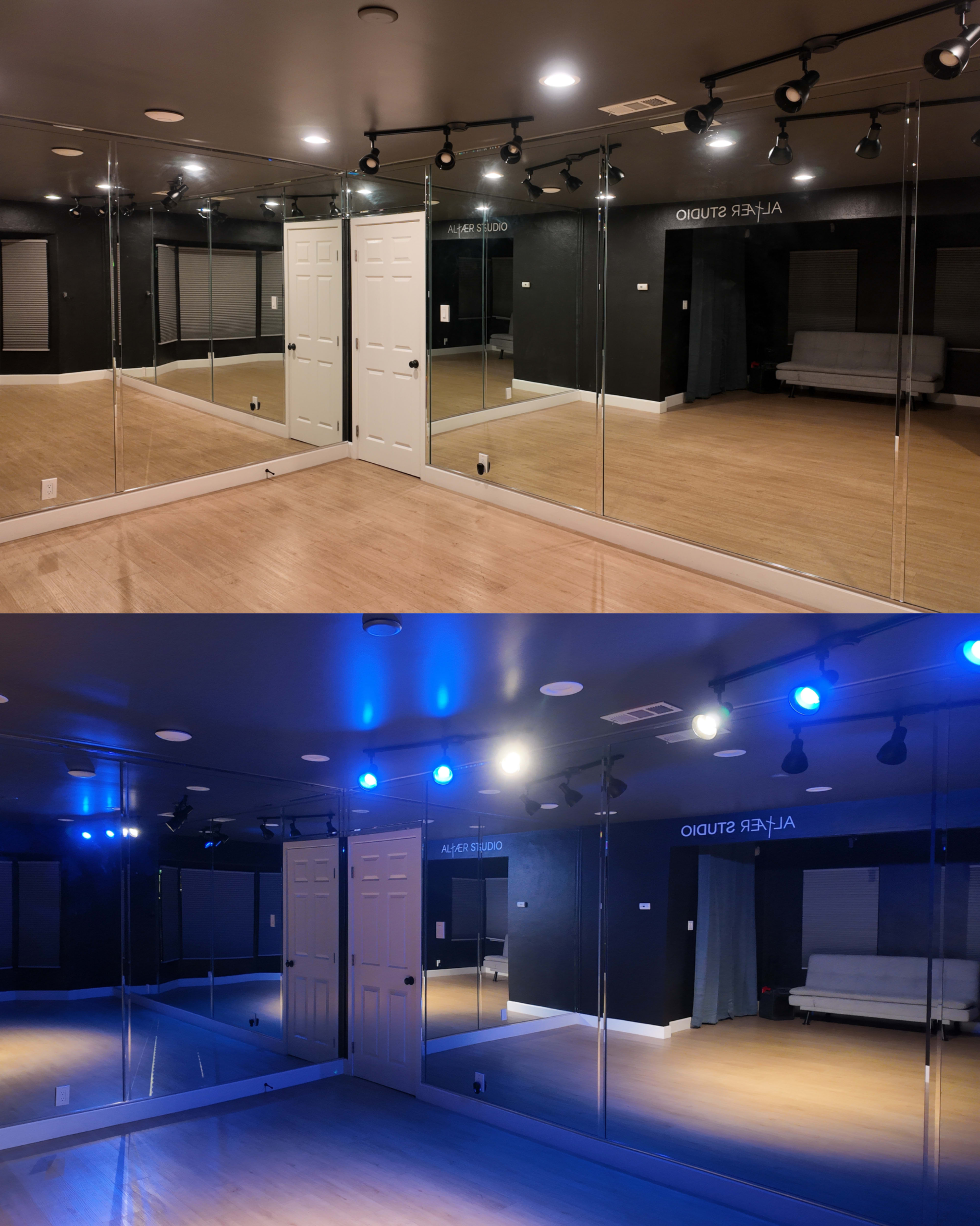 The image shows a dance studio featuring mirrored walls, a wooden floor, and adjustable lighting, with a door in the center and a seating area visible in the background.