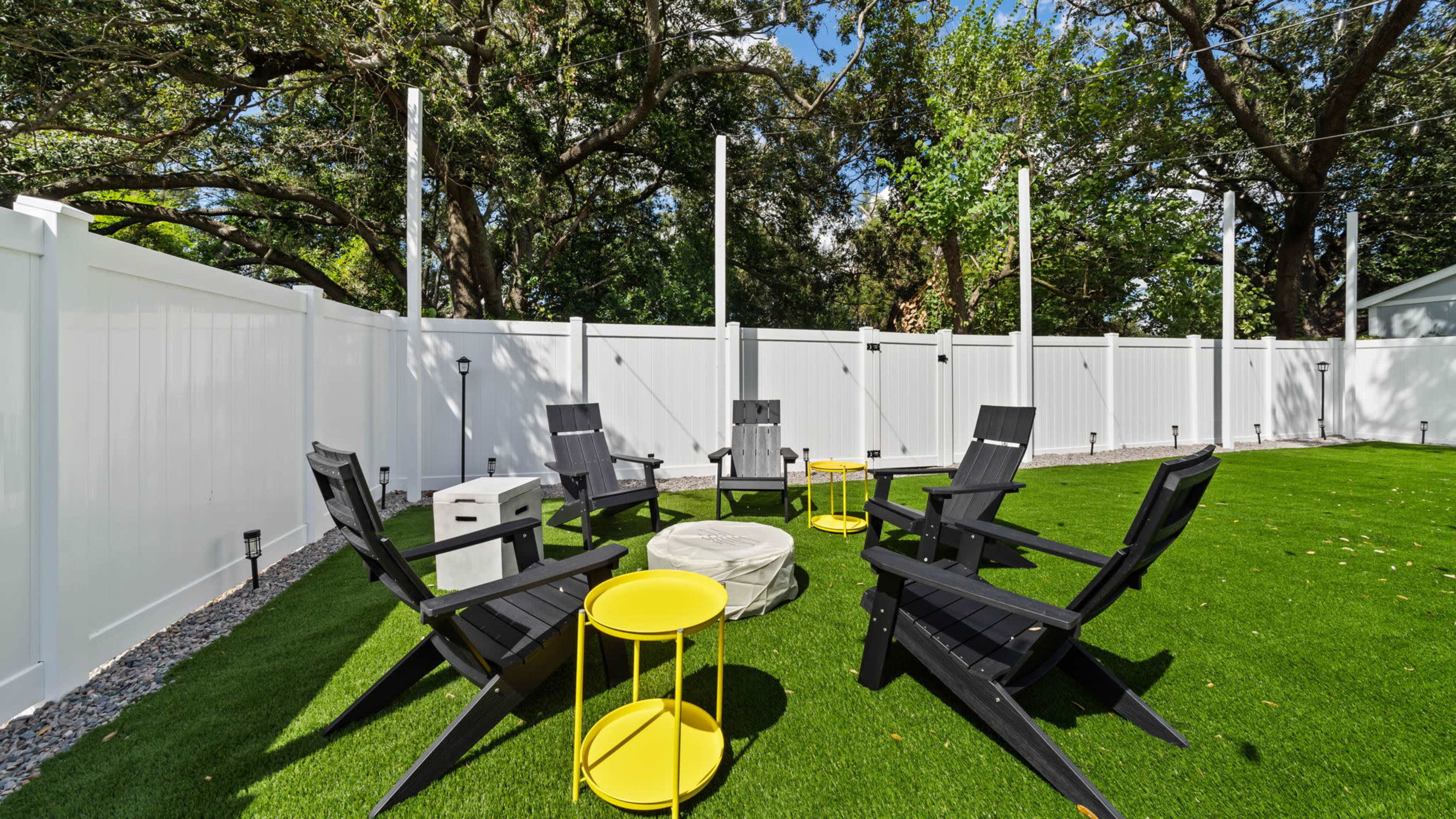 Spacious Backyard with Open Roof Treehouse Playground Image in Westshore, tampa, FL