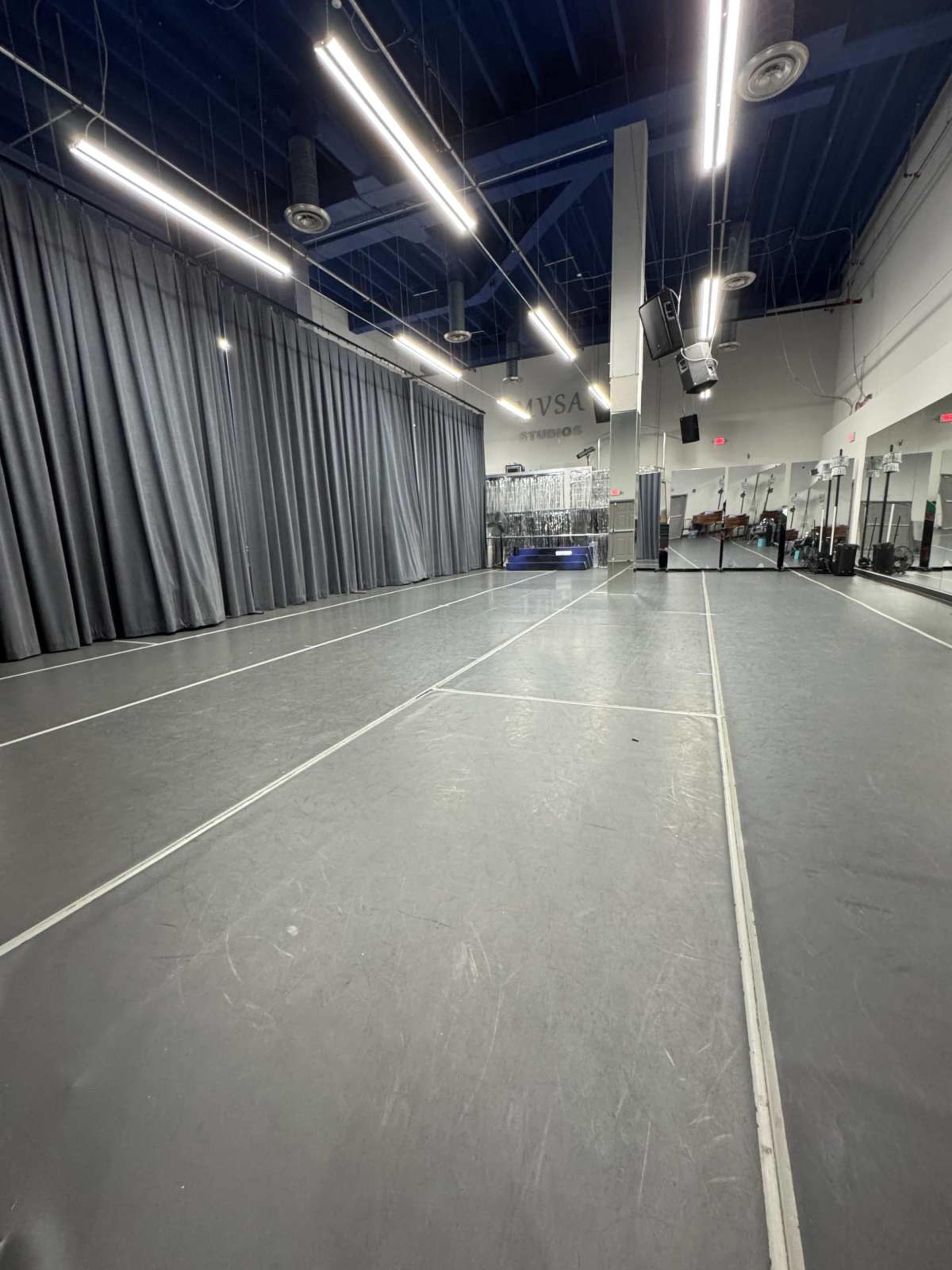 Open Concept Studio Space with Bar Floor to ceiling curtains Image in Kendall, Miami, FL