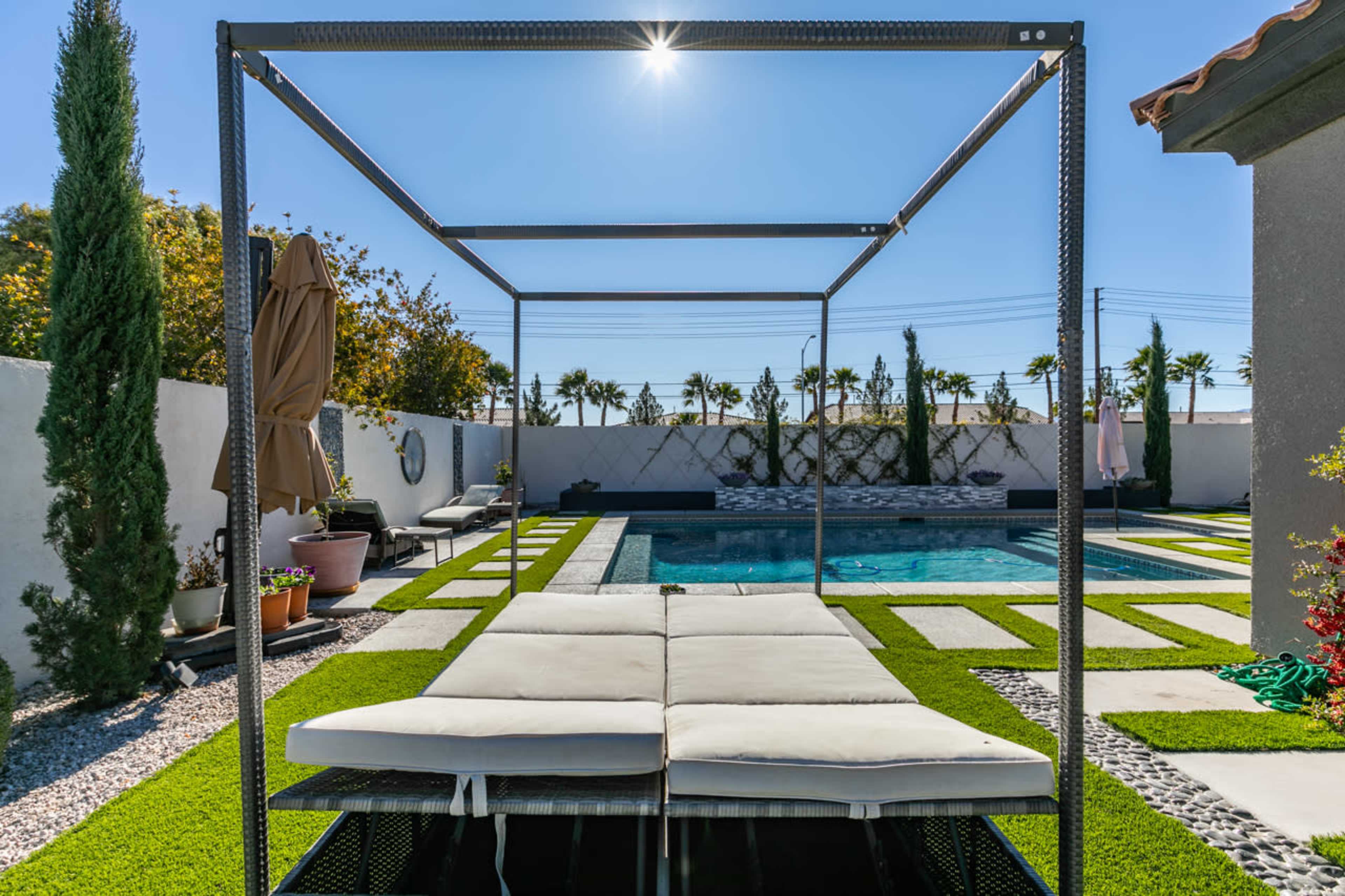Whimsical Private backyard with pool , patio, fire pit in quiet North West Las Vegas neighborhood. Image in Wyeth Ranch, Las Vegas, NV