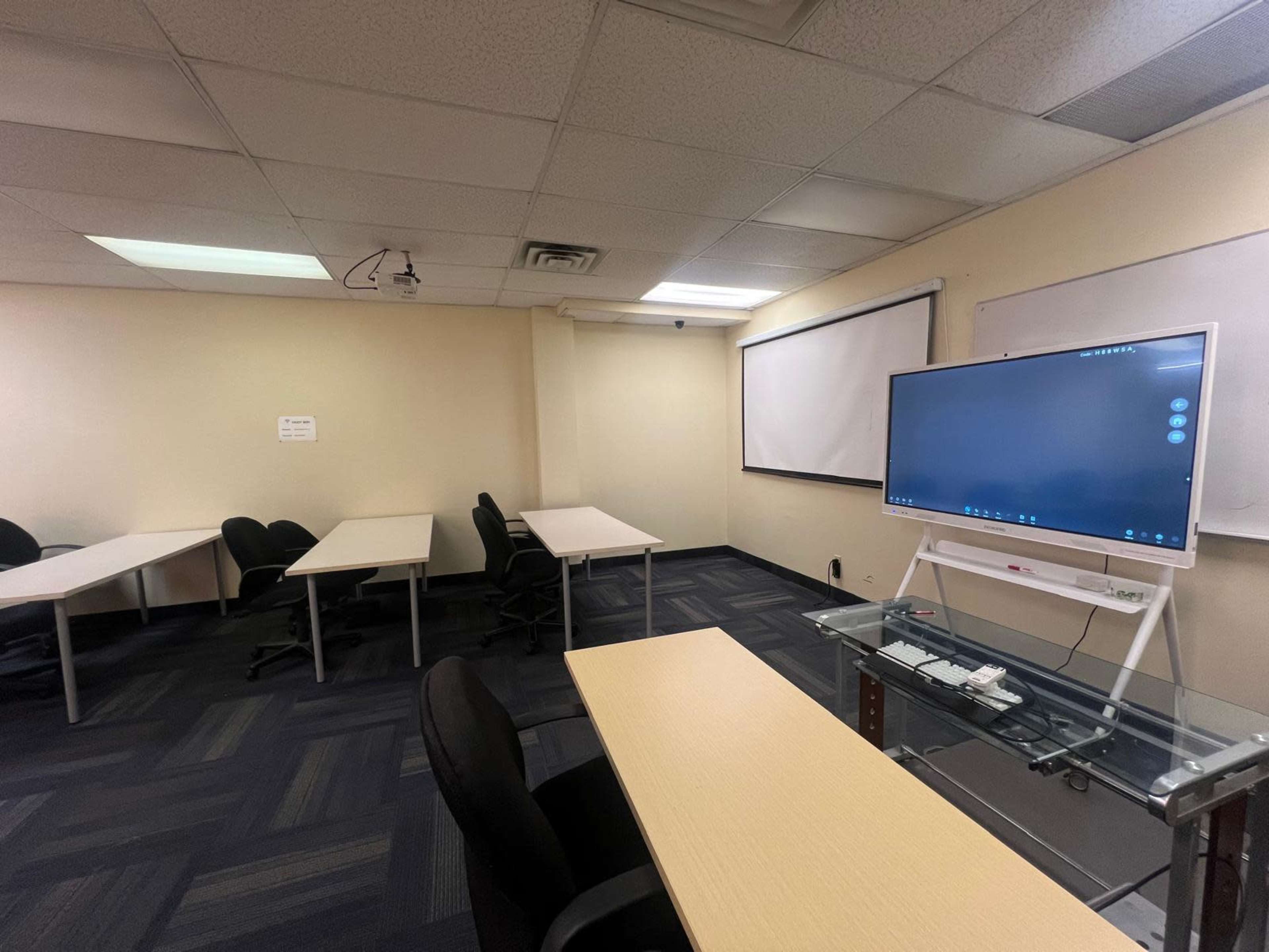 Modern Conference Room for 15 | Training & Meeting Space | Projector, Shared Kitchen & Common Area in Mississauga" Image in Mississauga, Mississauga, Canada L4W 1E3, ON