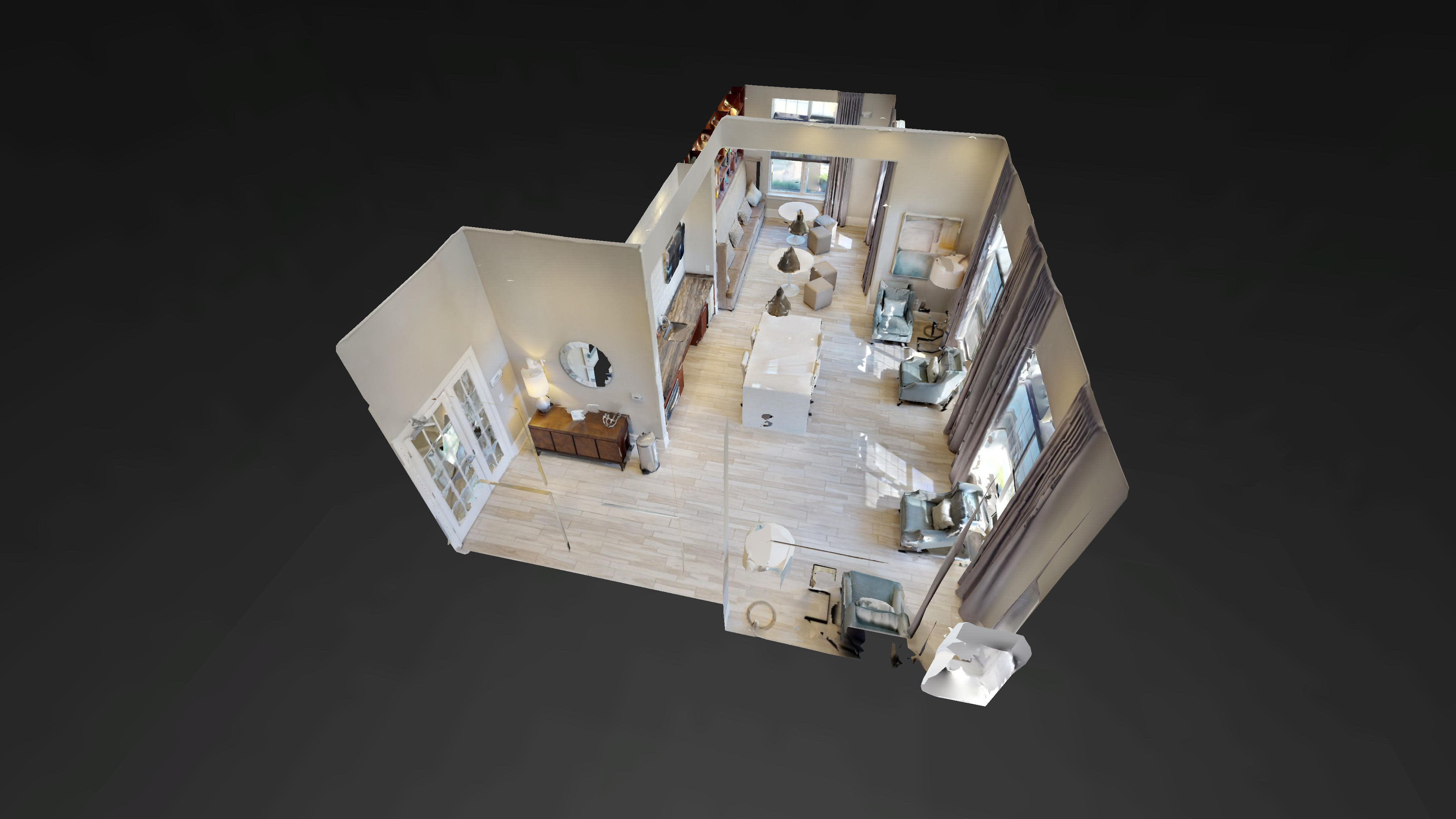 A 3D layout of a light-colored living space featuring a lounge area with chairs, a coffee table, and large windows, alongside a dining area and decorative elements.