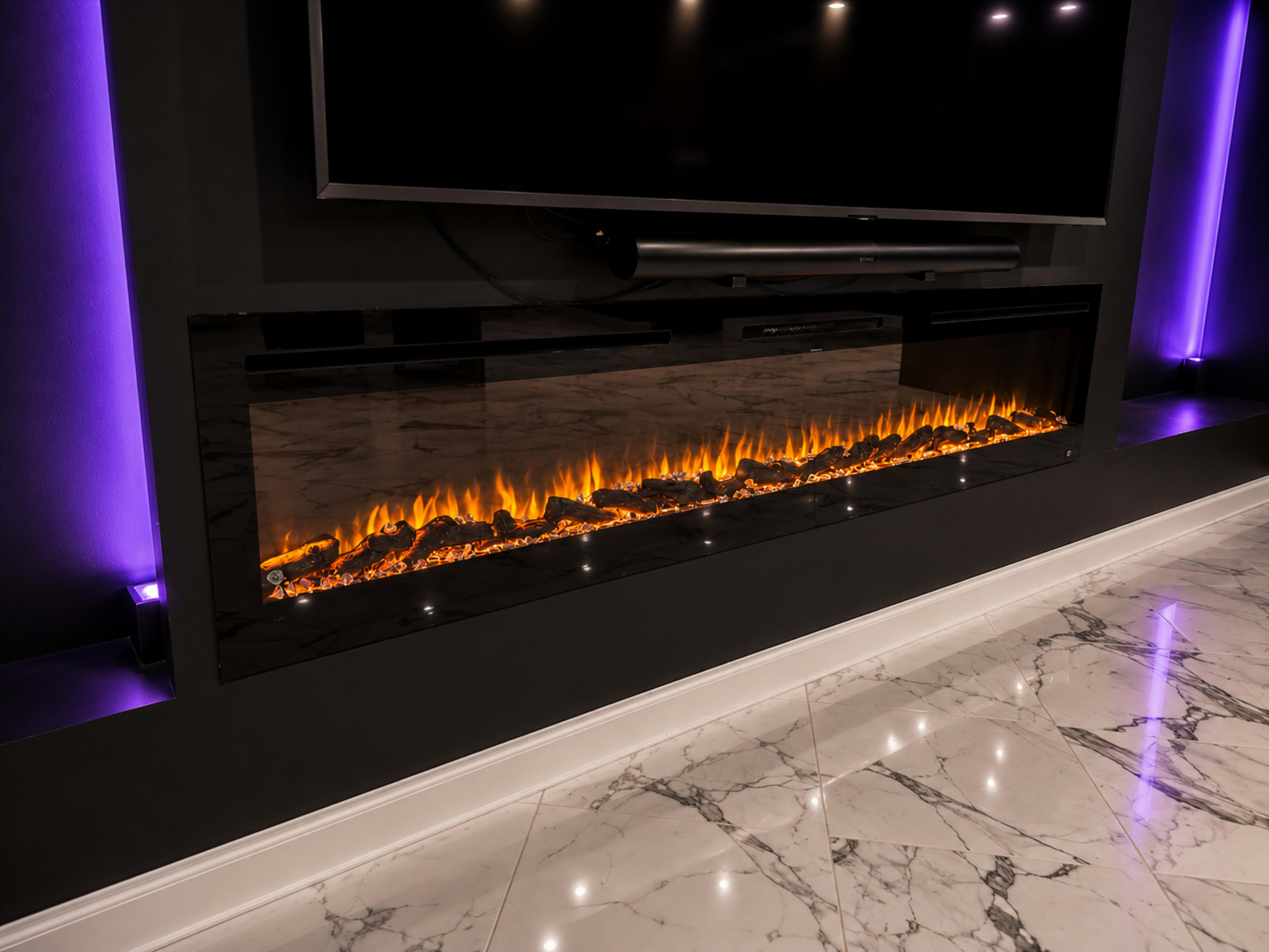 A modern electric fireplace is installed beneath a wall-mounted television, surrounded by dark walls and purple LED lighting, with a polished marble floor reflecting the light.