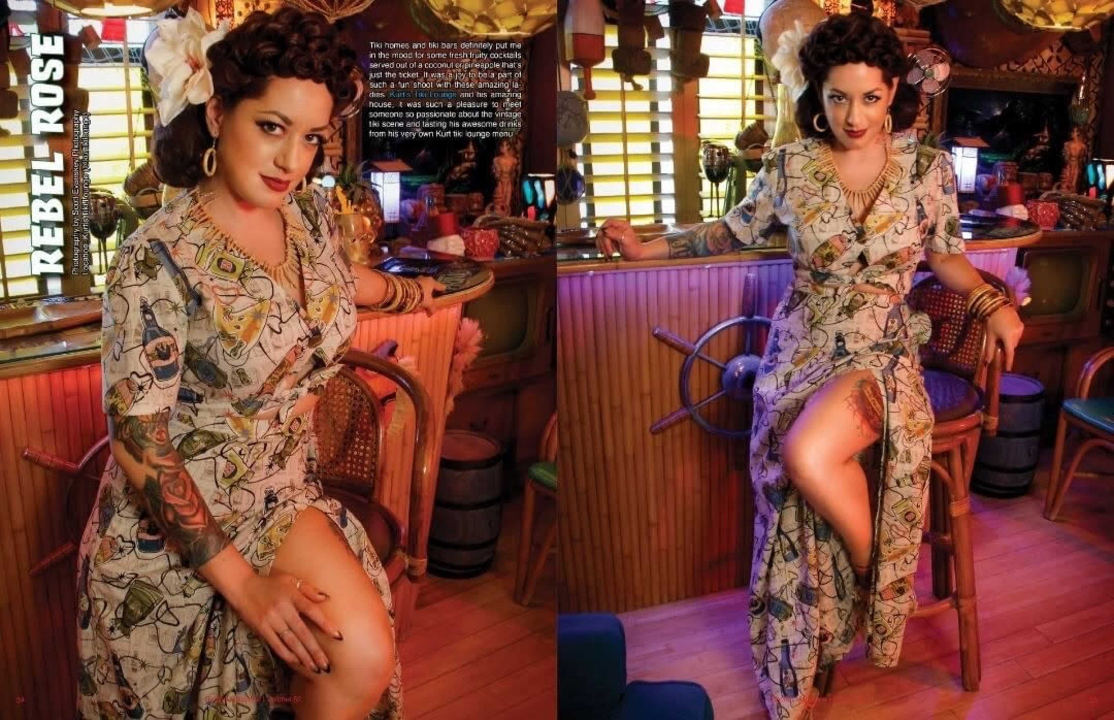 A woman in a patterned dress sits on a wooden stool in a colorful, eclectic bar filled with various decorations.