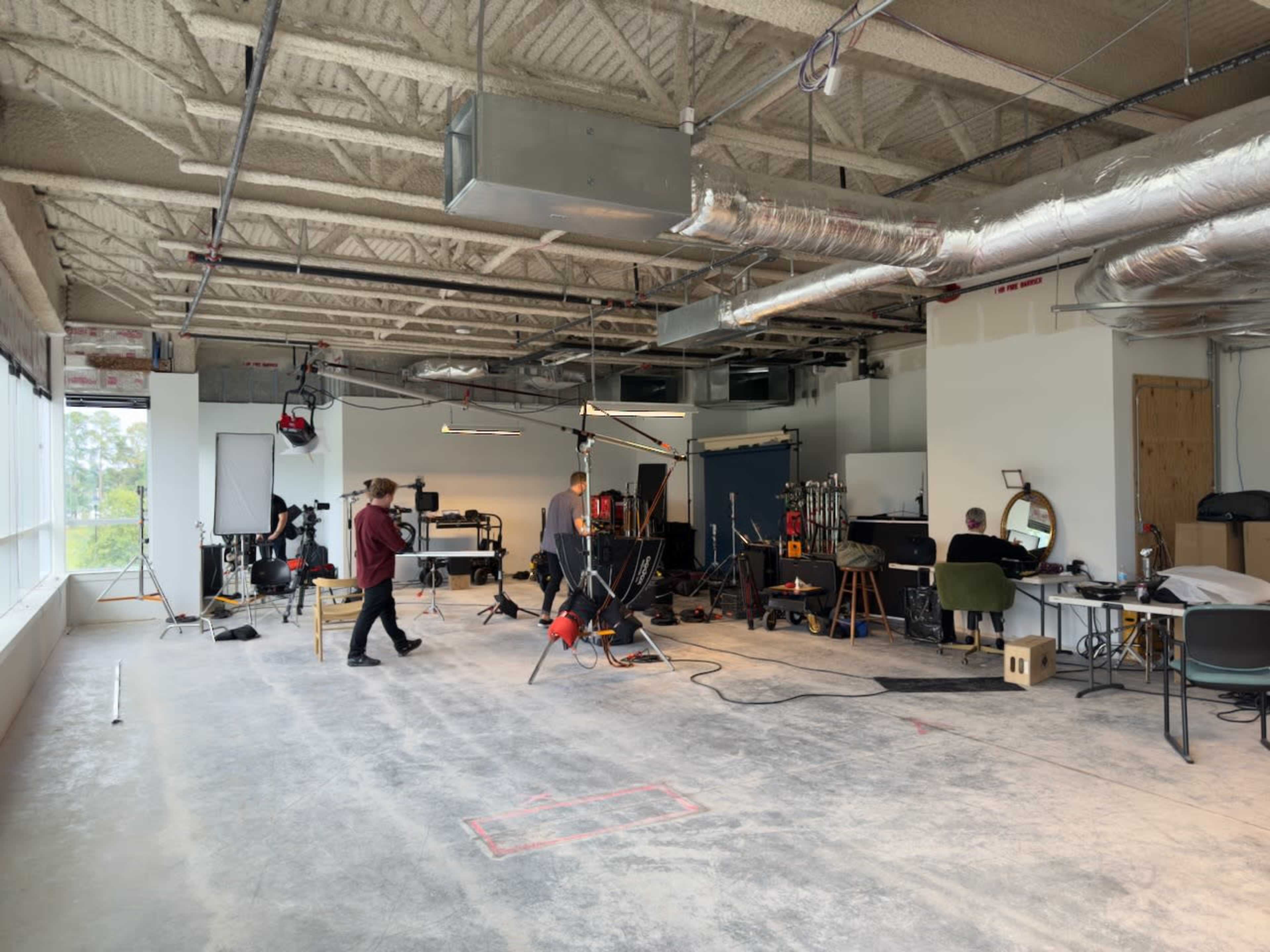 Podcast Studio, Industrial Studio space, white walls, concrete floors, high ceilings. Image in Central Newport News, Newport News, VA