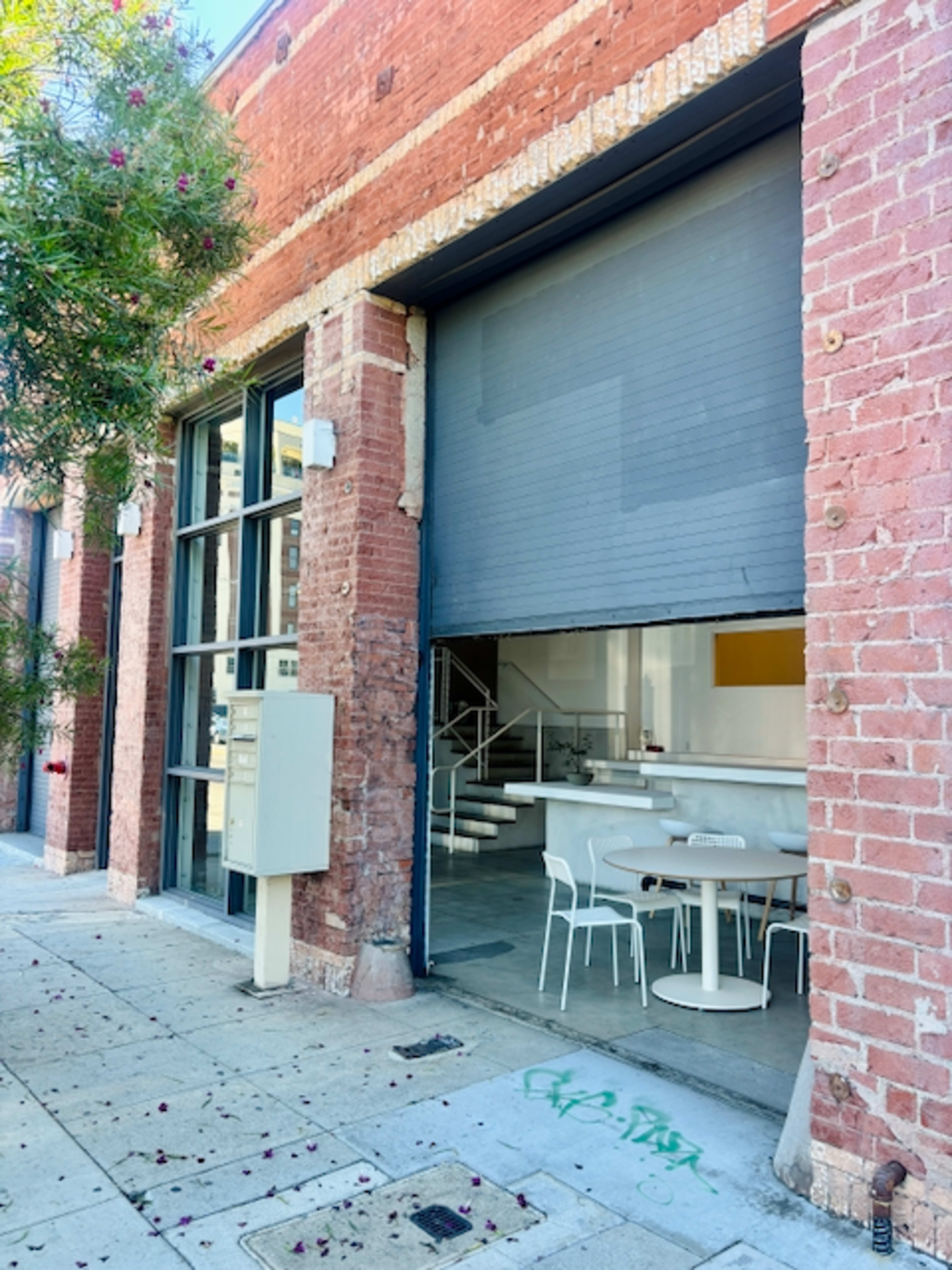 Arts District Bright Modern Event Space with Cafe/Bar | Gated Parking | Rollup Door Access Image in Central LA, Los Angeles, CA