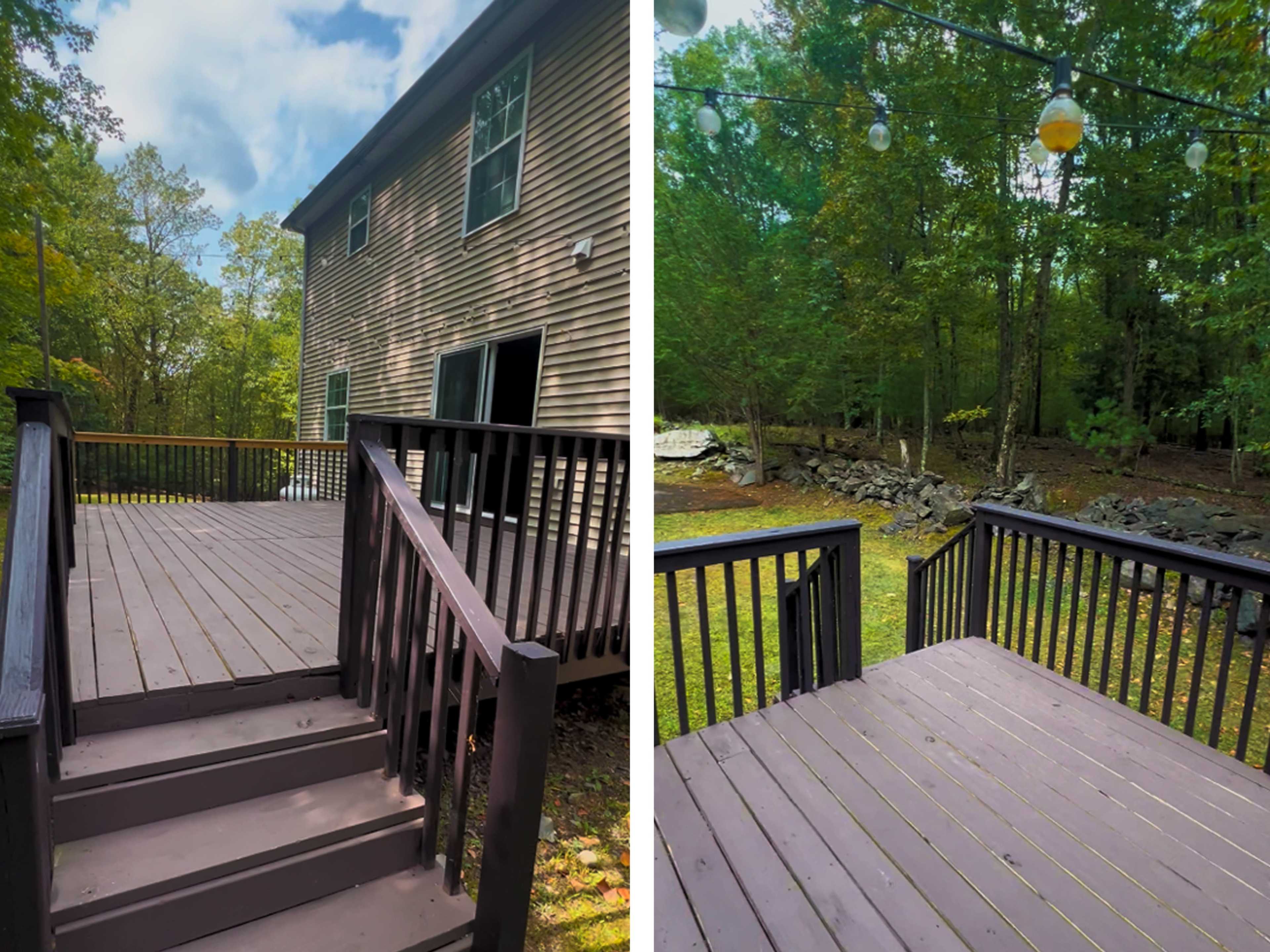 The image shows a wooden deck attached to a house, surrounded by trees and greenery.