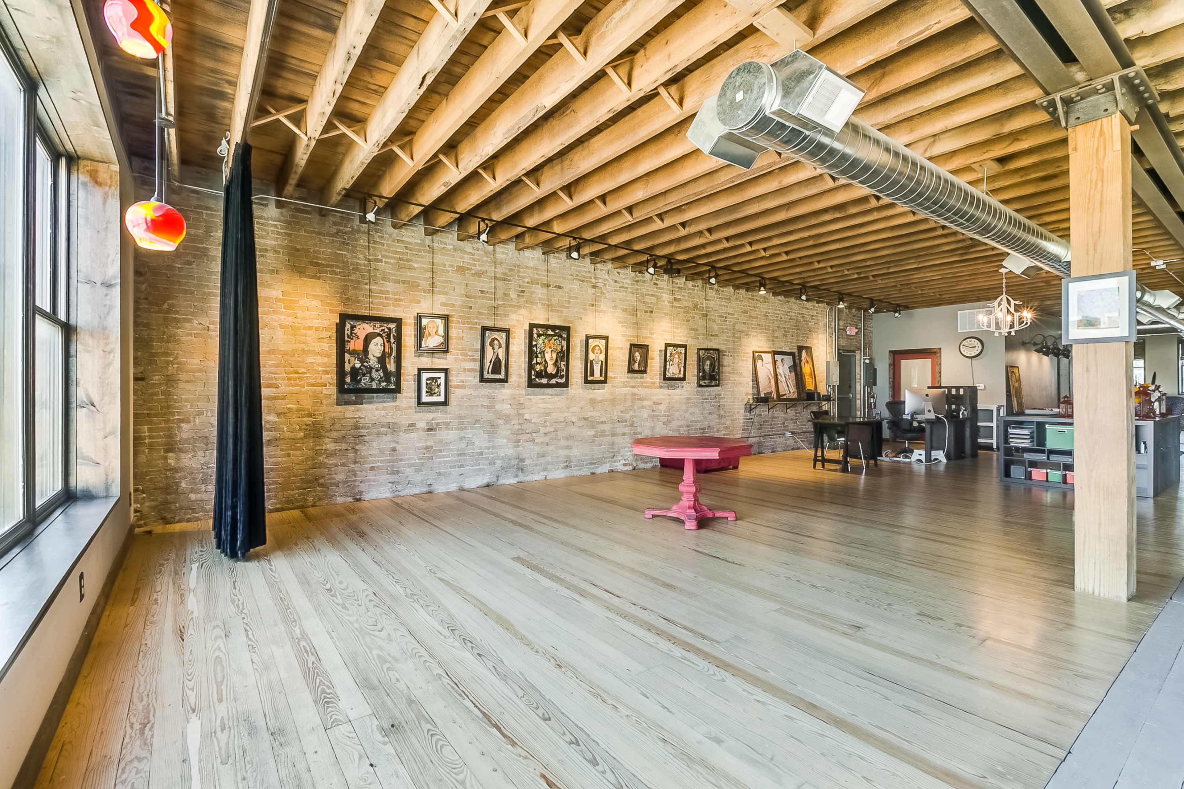 Chic, historic  loft with natural light and artistic charm. Image in Racine, Racine, WI