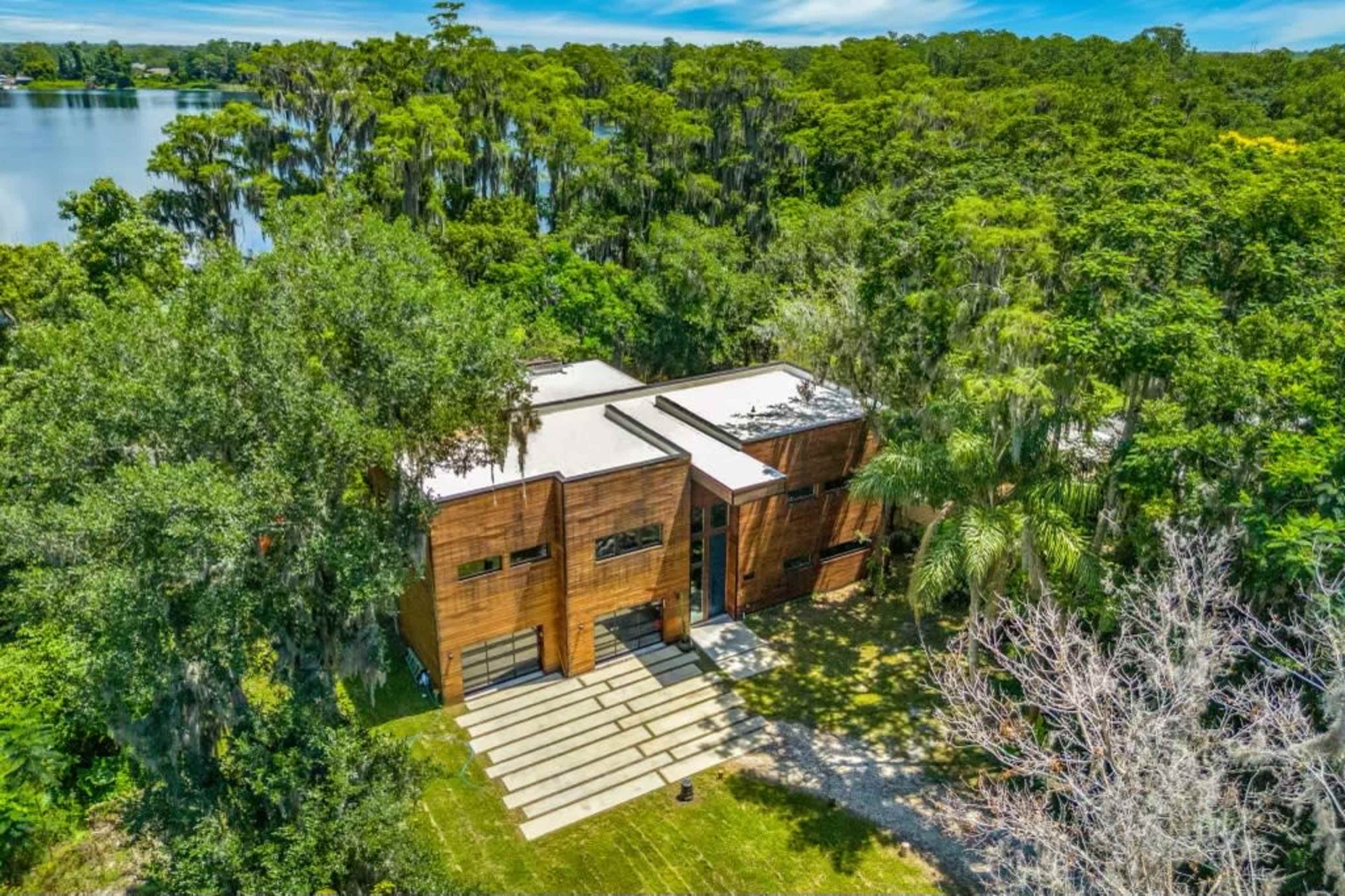 Lakefront Luxury Home with Private Gate & Expansive Grounds Image in Southeast Orlando, Orlando, FL