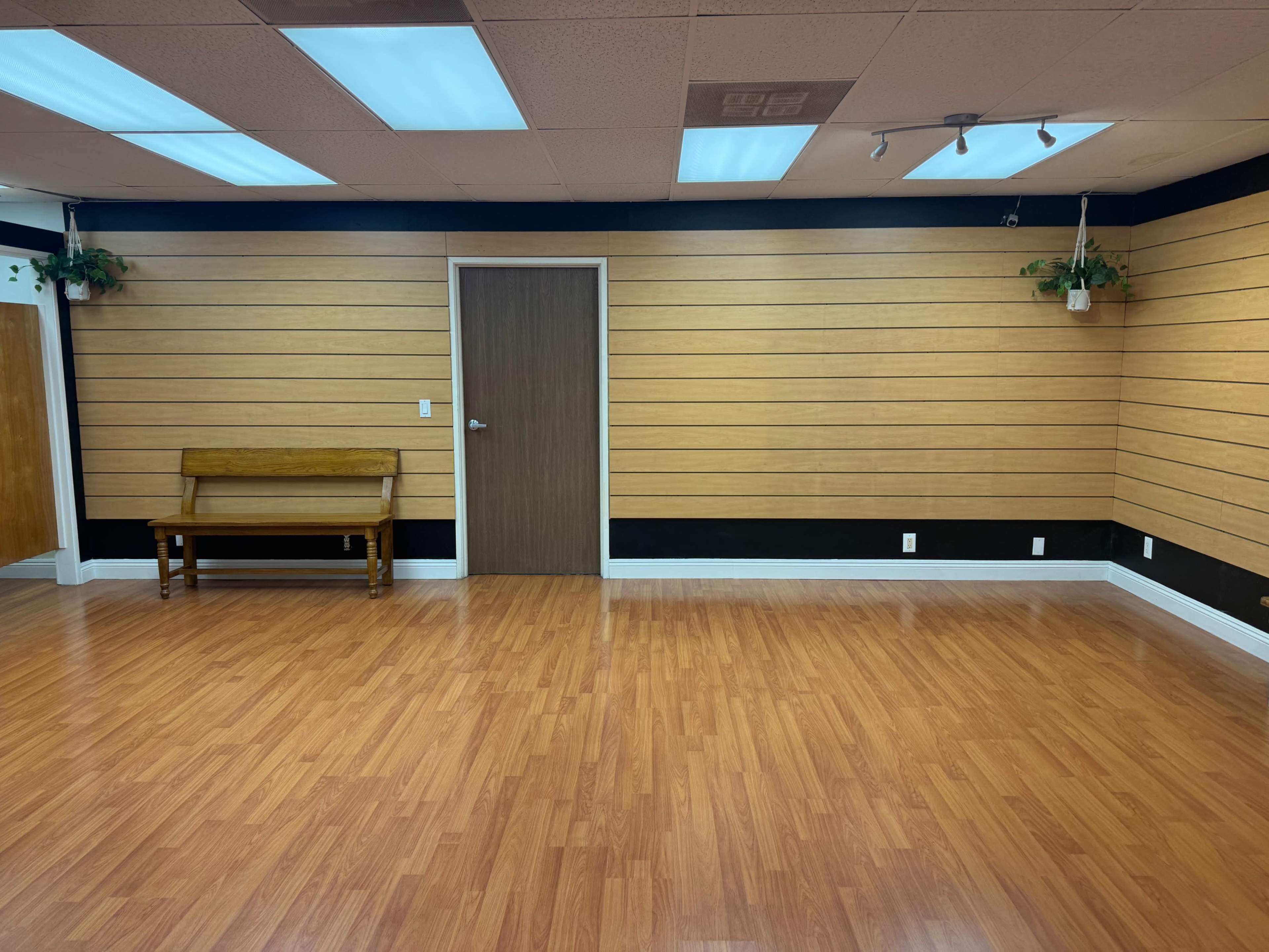Intimate dance studio or photoshoot space at the back of Atomic Dancewear Store Image in Irvine Business Complex, Irvine, CA