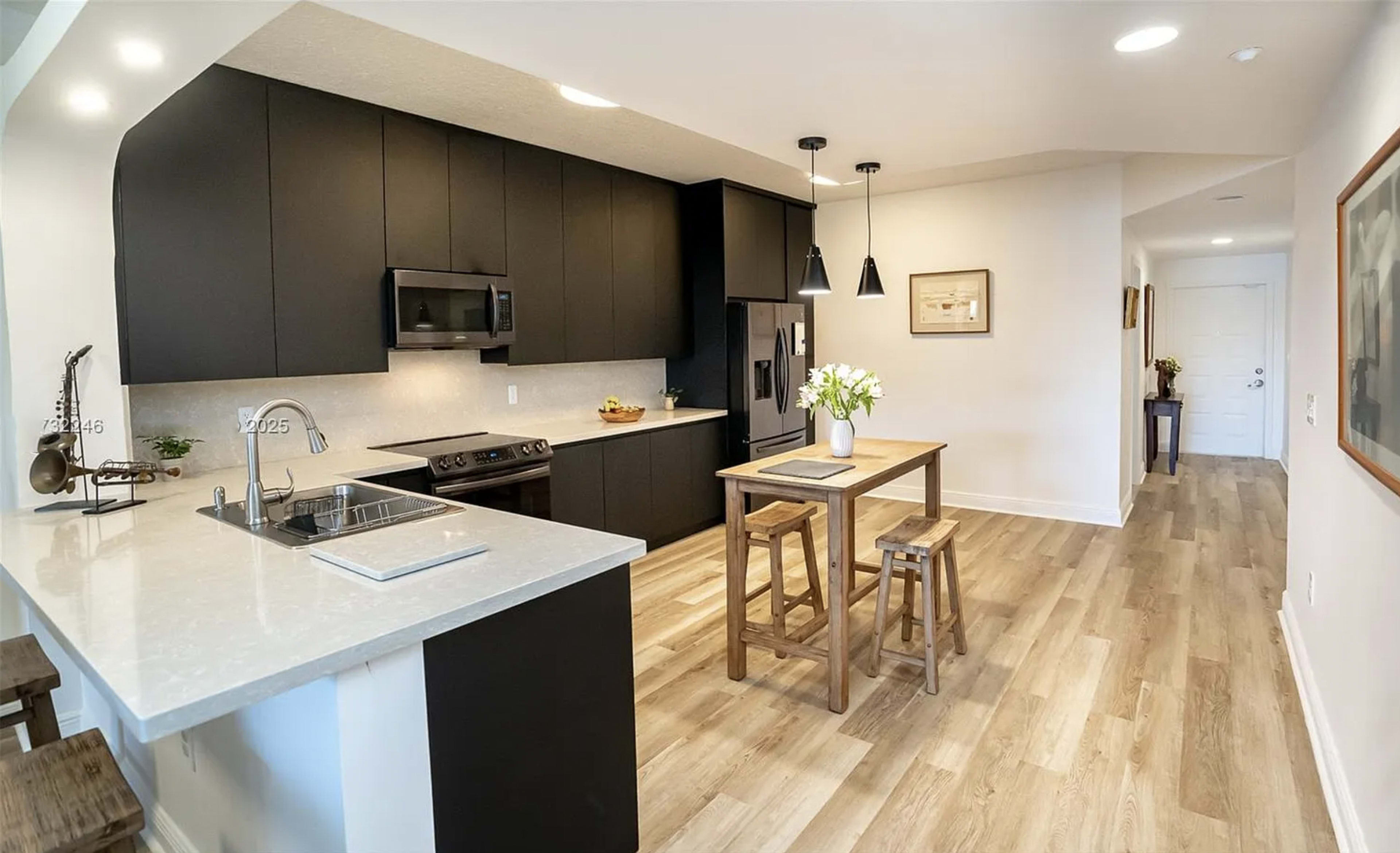 Artful Apartment with Sleek Minimalist Kitchen Image in Doral, Doral, FL