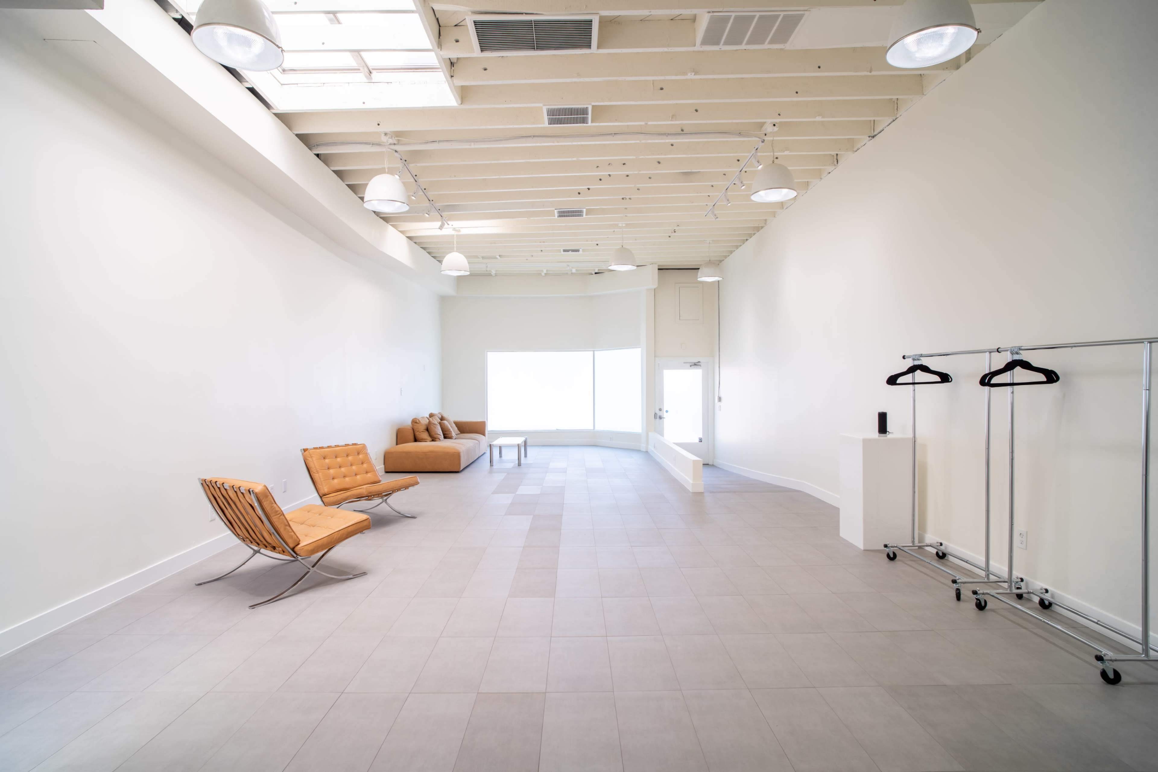 Melrose Fairfax District Minimalist Daylight Photo and Video Studio Space with Modern Minimalist Furnishings and Backdrops Image in Beverly Grove, Los Angeles, CA