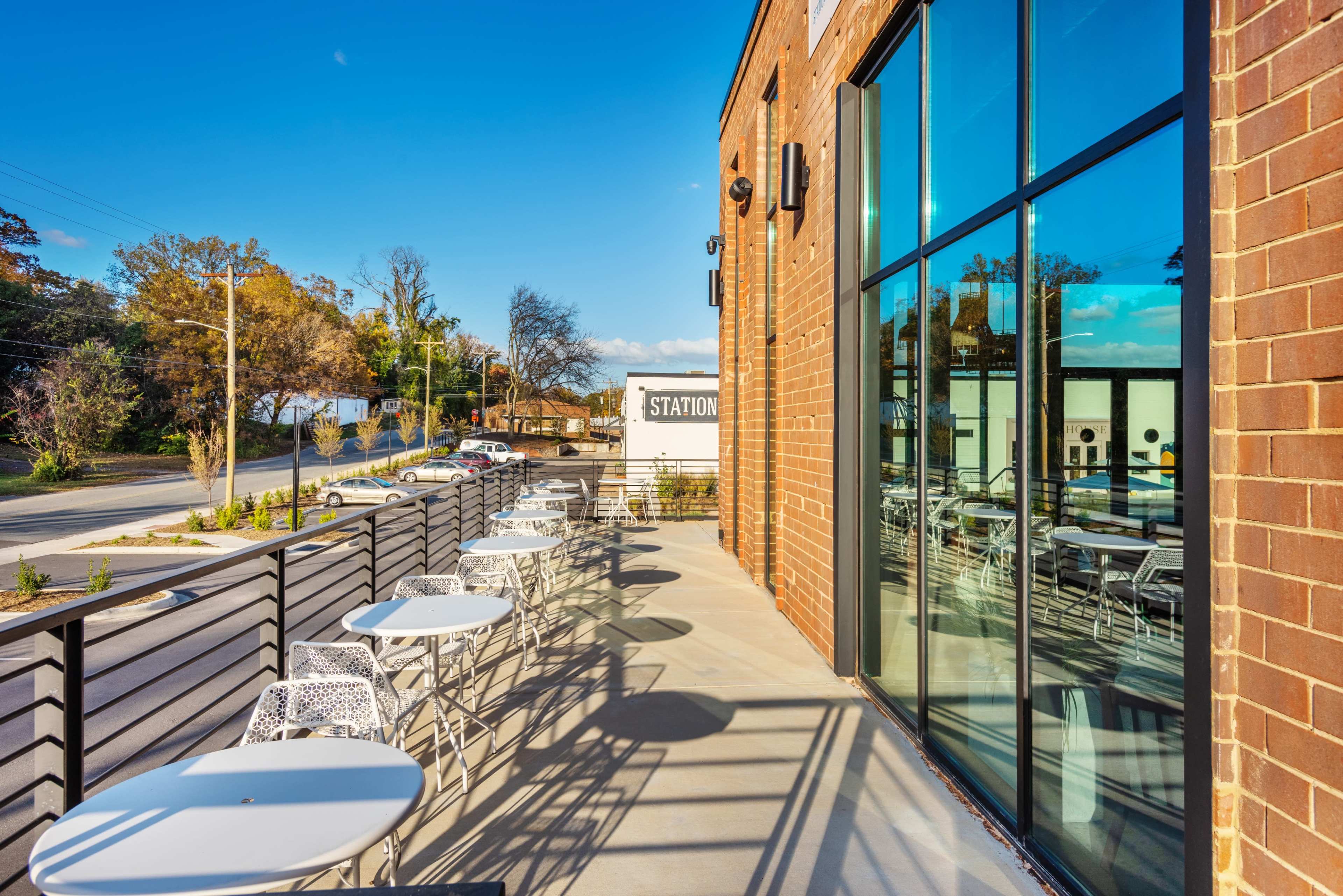Glass Conference Room in Industrial Coffee Shop Image in Seversville, Charlotte, NC