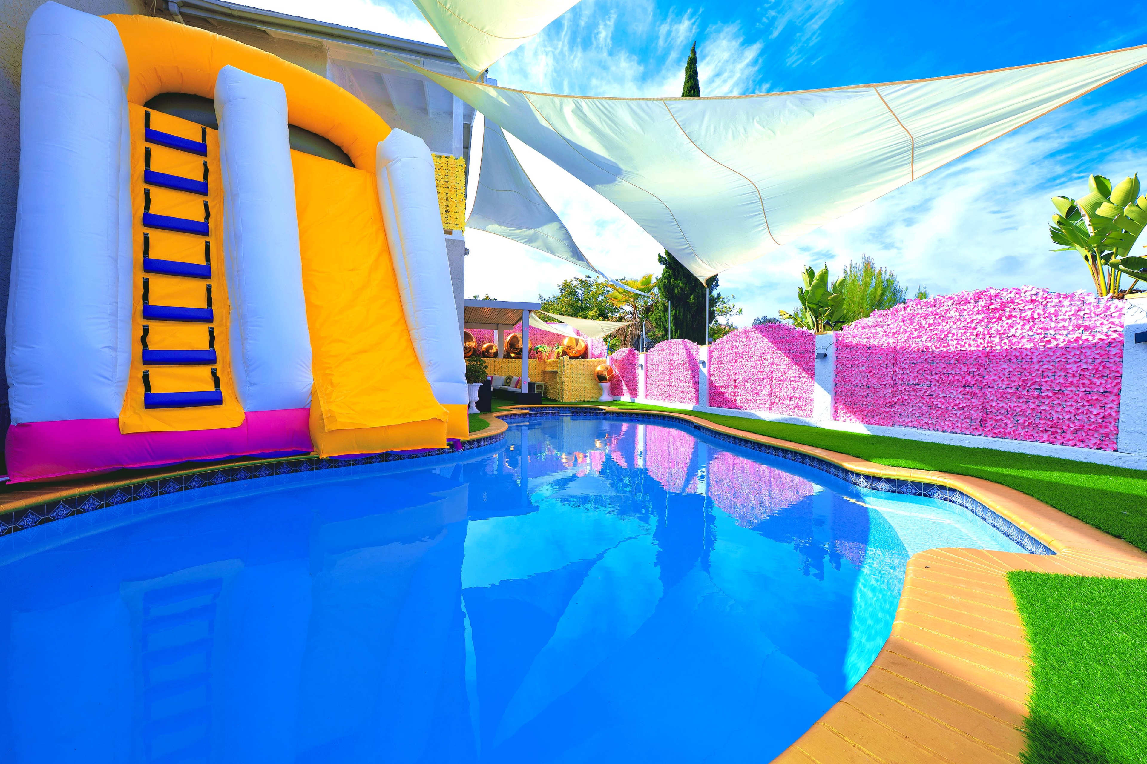 Barbie-Inspired Dream House with Pool, Domes & Red Rose Photo Zone Image in Paradise Hills, San Diego, CA