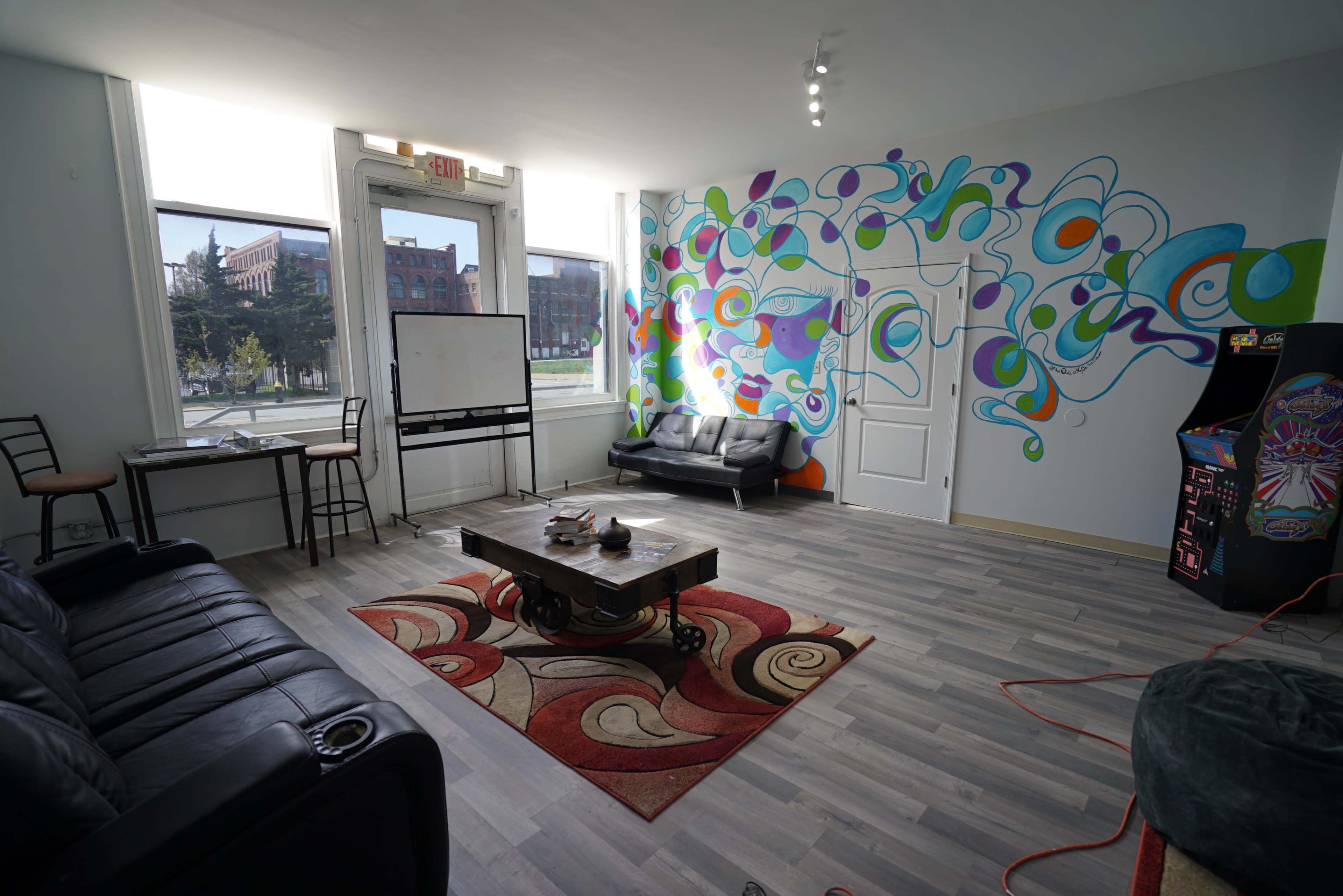 Bright Creative Meeting Space with Large Windows and Open Layout Image in Downtown West, Saint Louis, MO