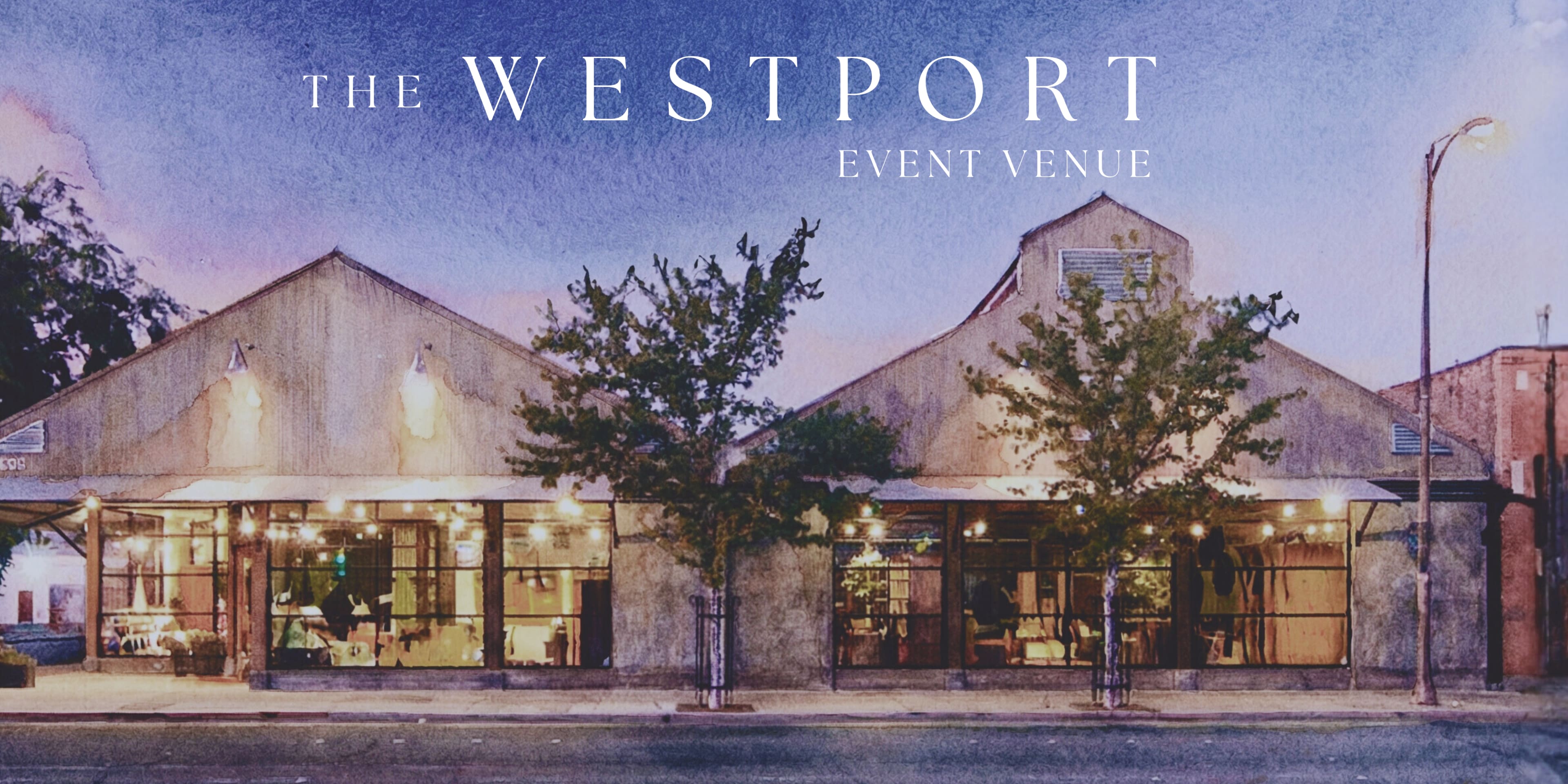 The image features a rustic event venue with two distinct buildings, showcasing large windows and outdoor trees, under an evening sky.