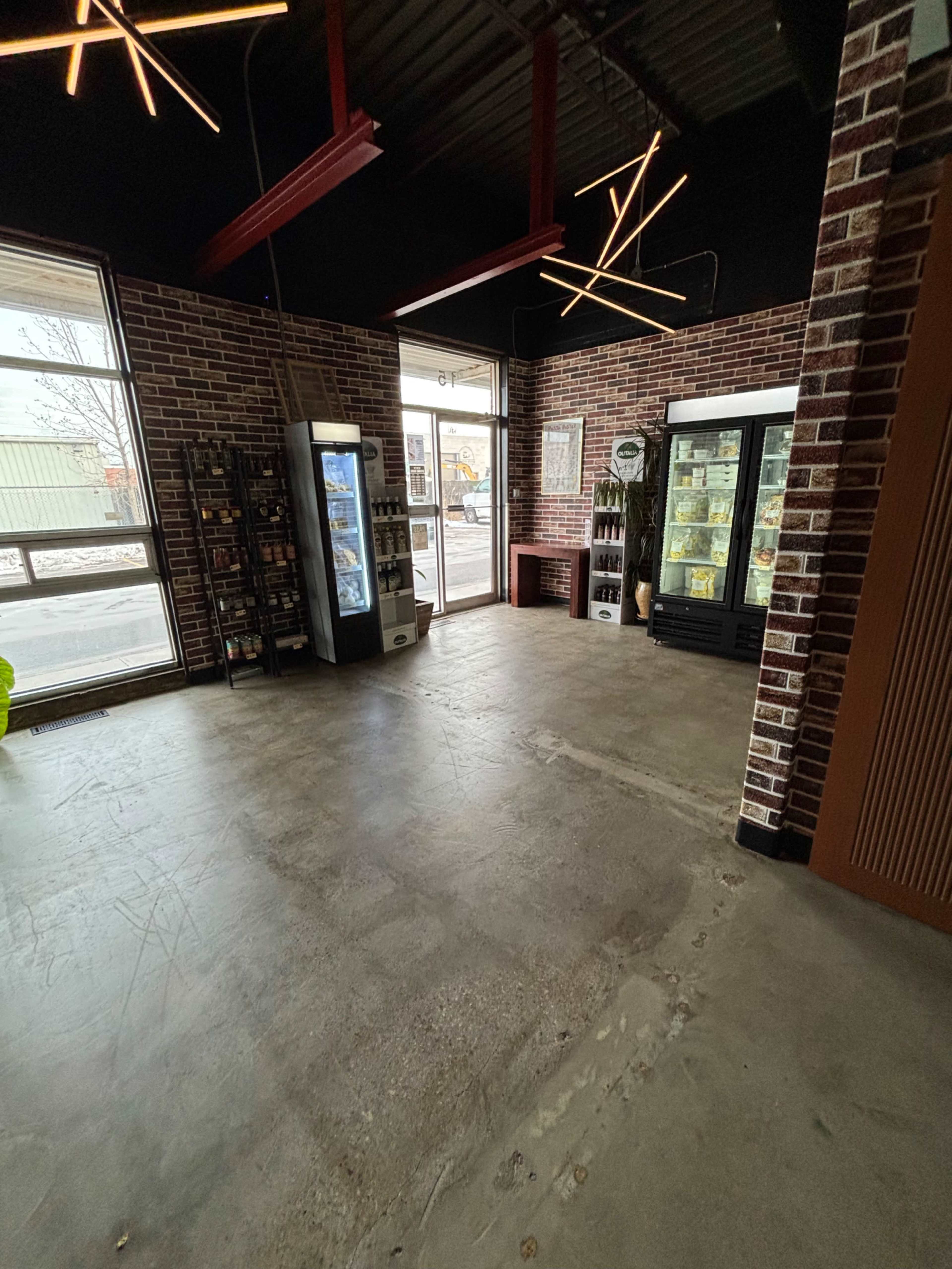 Modern industrial inspired retail space with commercial kitchen Image in Humber Summit, Toronto, ON