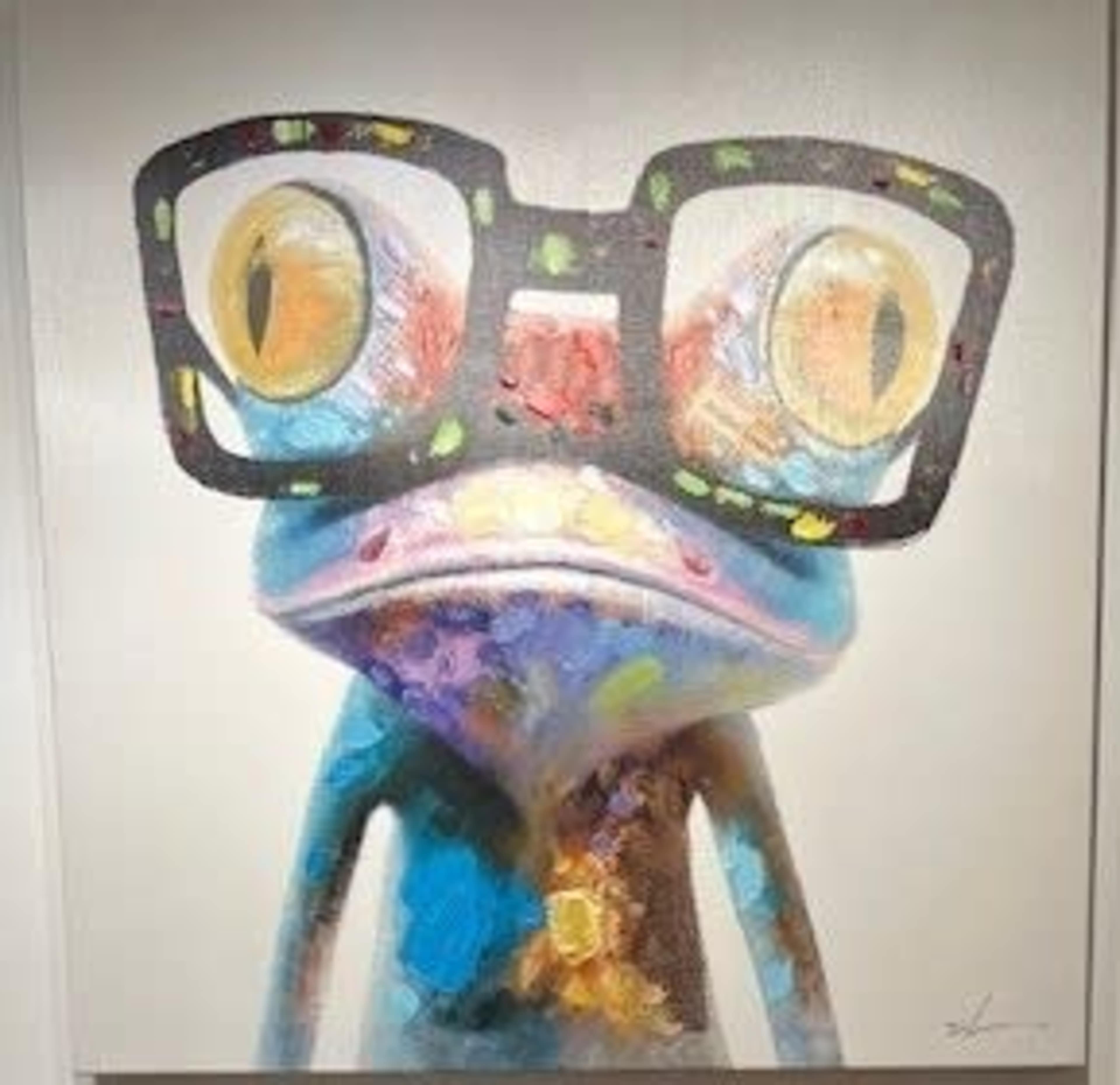 A colorful, stylized frog wearing oversized glasses.
