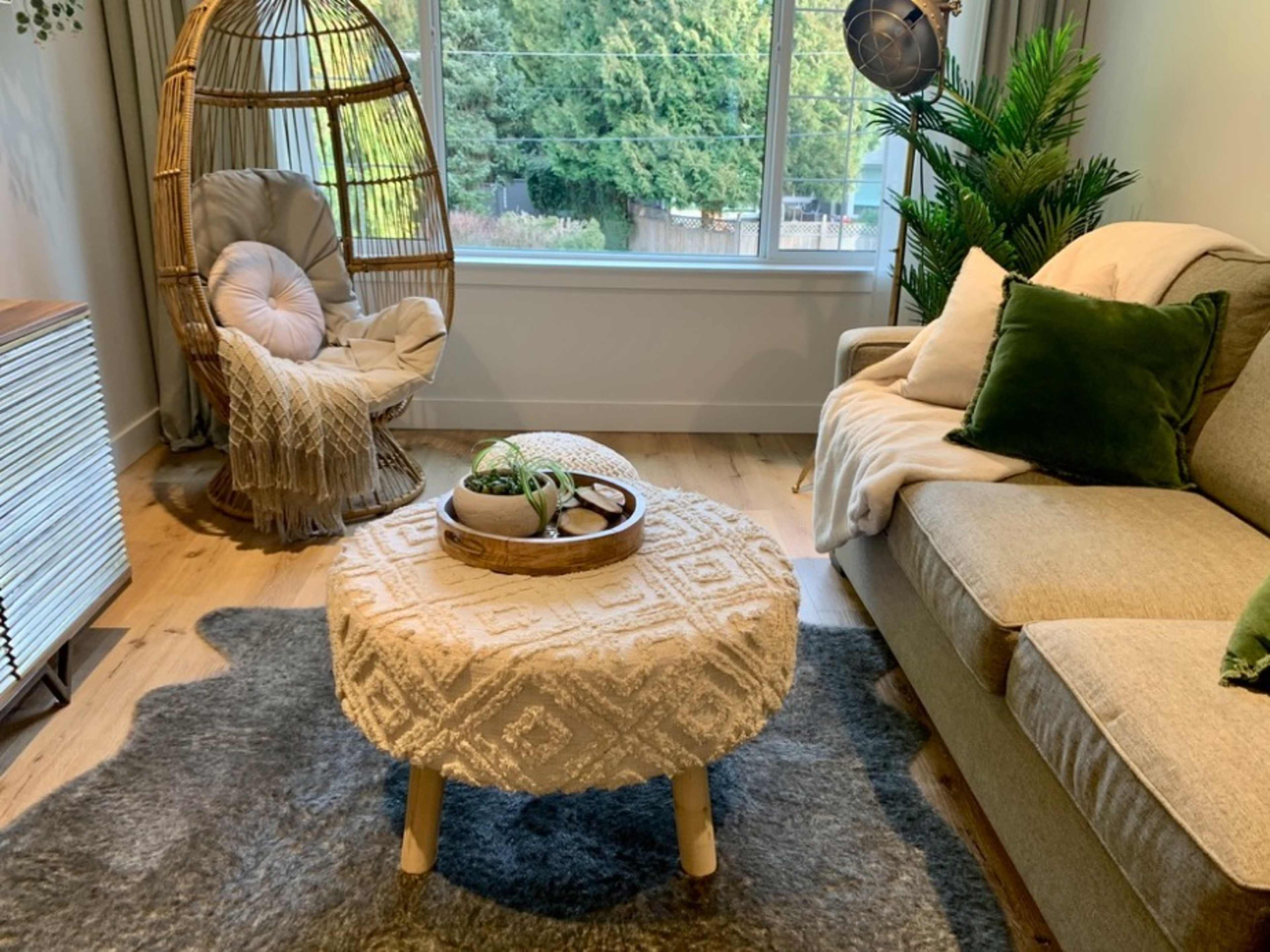 CREAM BOHO OTTOMAN with light wood legs
