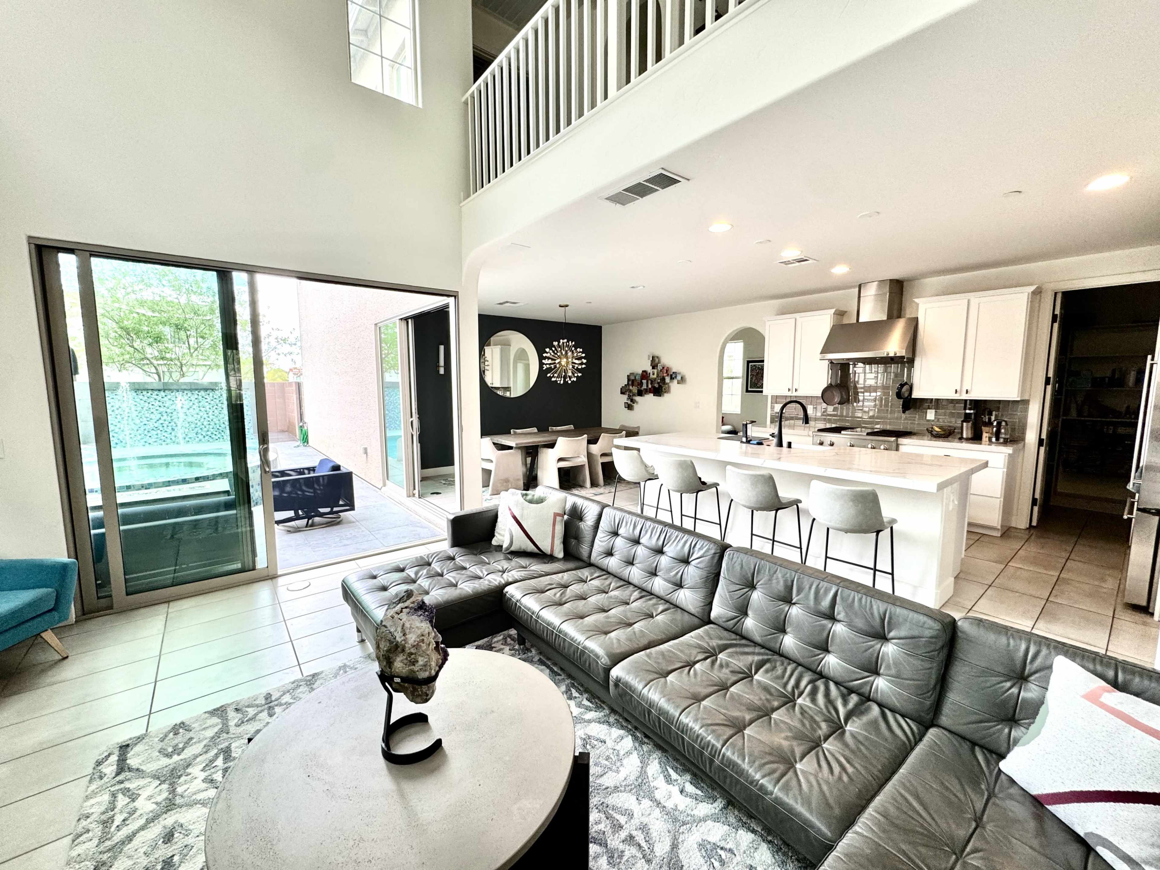 Contemporary Mid-Century Suburban House w/ Indoor-Outdoor Flow & Designer Pool Image in MacDonald Ranch, Henderson, NV