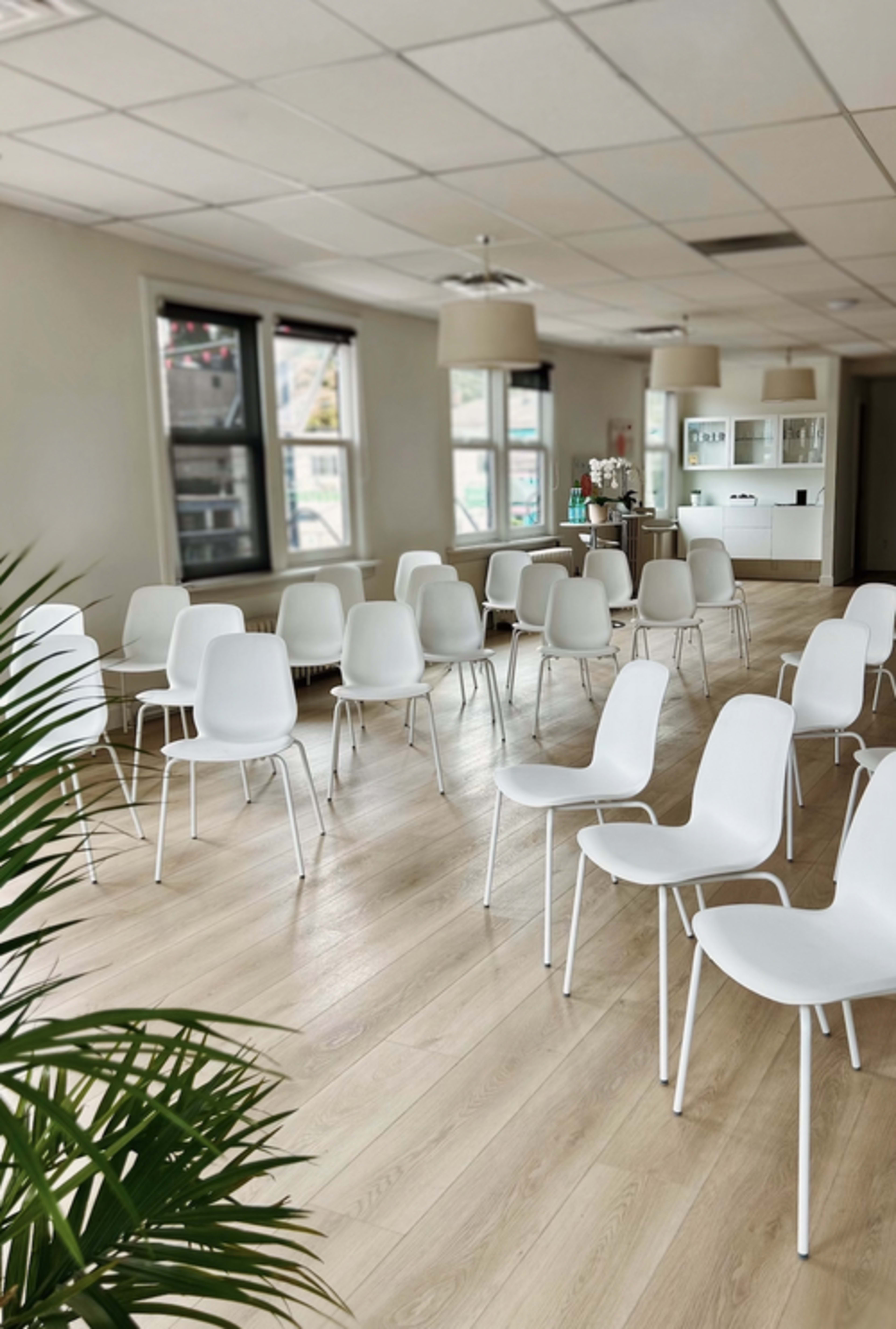 A bright, airy studio with mountain views — a serene space to move, breathe, and connect. Image in West Side, Vancouver, BC