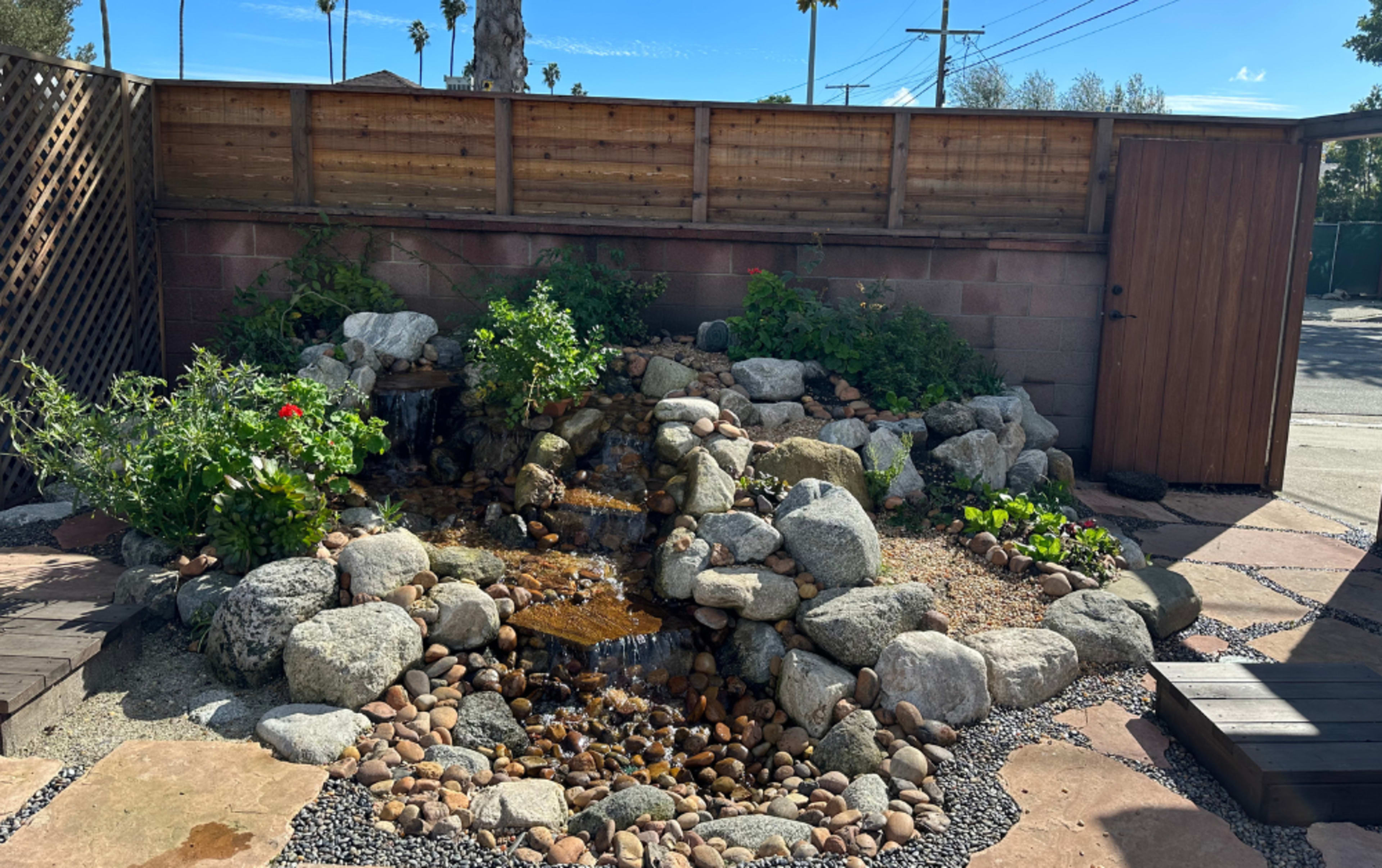 Hidden Backyard Garden Oasis in Leimert Park with Waterfall Image in Jefferson Park, Los Angeles, CA