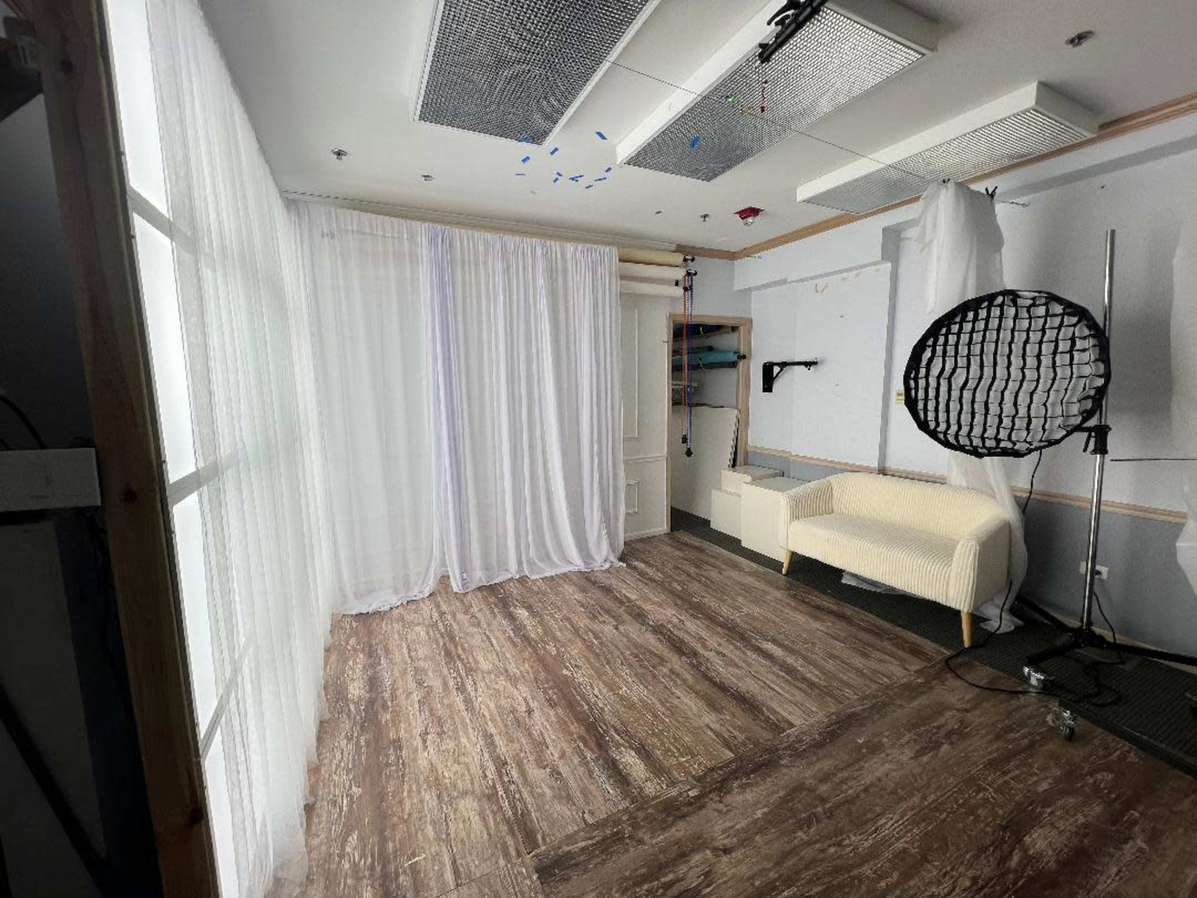 Photography Studio with boho room, seamless paper backdrops, and LED window walls. Image in Winfield Township, Winfield, IL