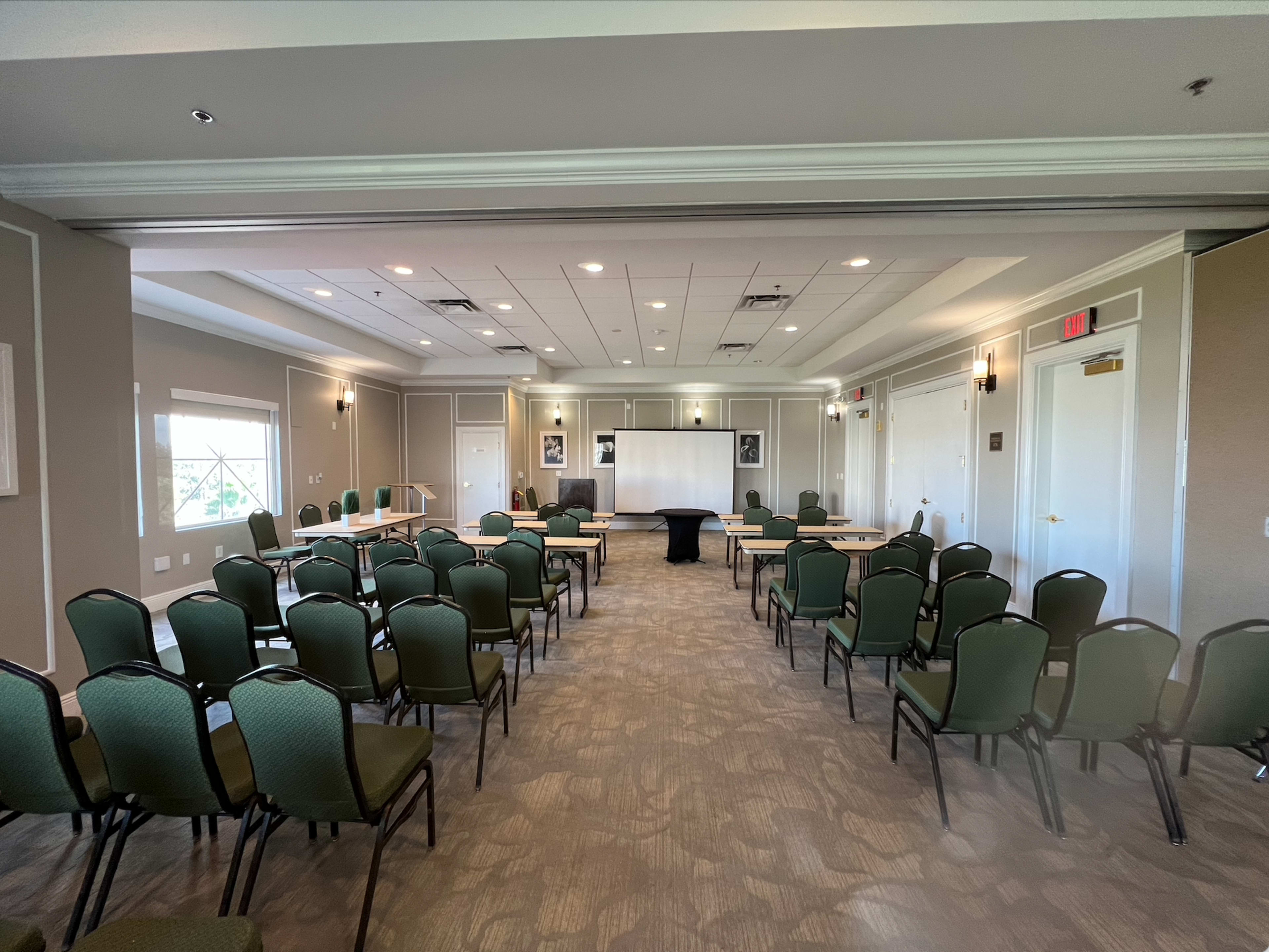Elegant Meeting Room at The Point Hotel & Suites near International Drive Image in Florida Center, Orlando, FL