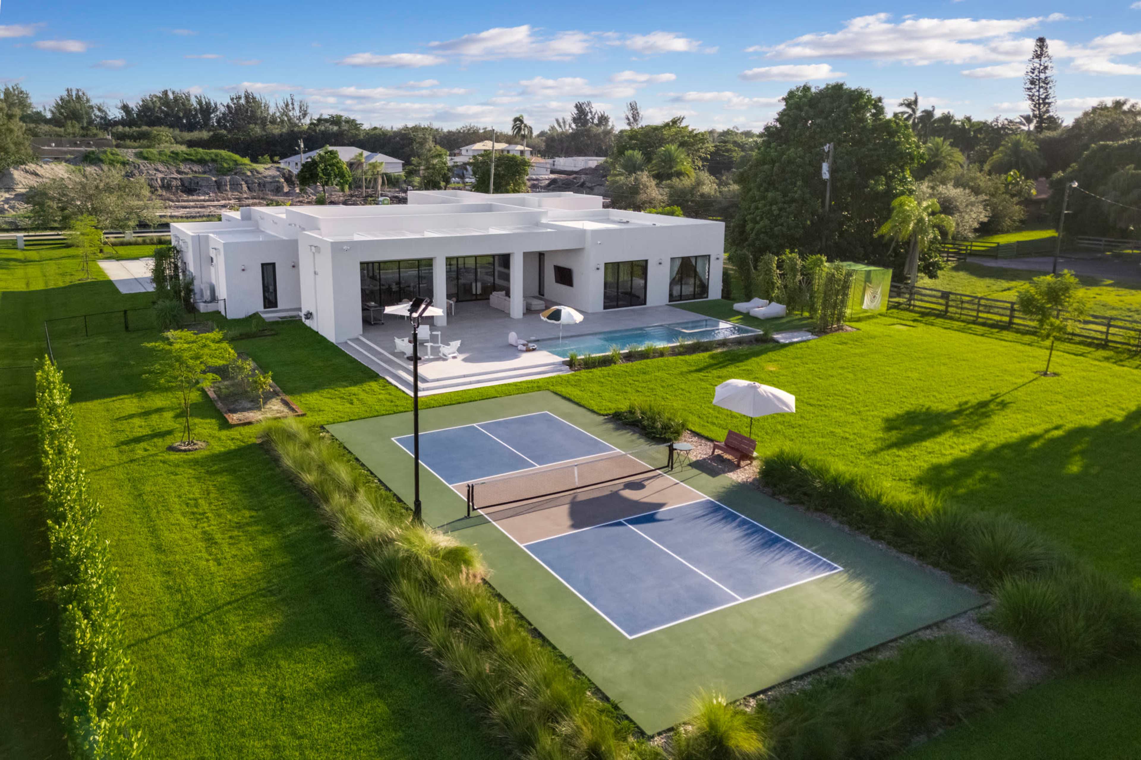 Modern Hacienda Retreat with Pickleball Court, Expansive Patio & Chef’s Kitchen Image in Plantation, Plantation, FL