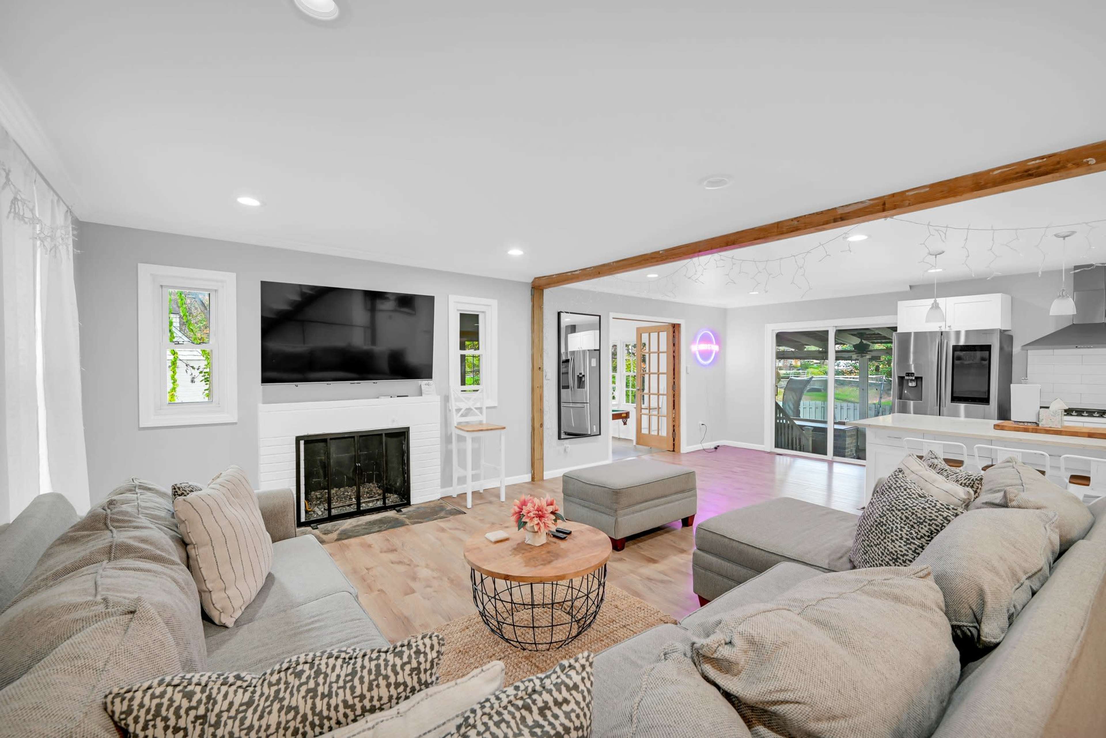 Modern Open Concept Entire single family home with basketball court and full deck in the back yard. Small creek runs as well on side of property. Image in Englewood, Englewood, NJ