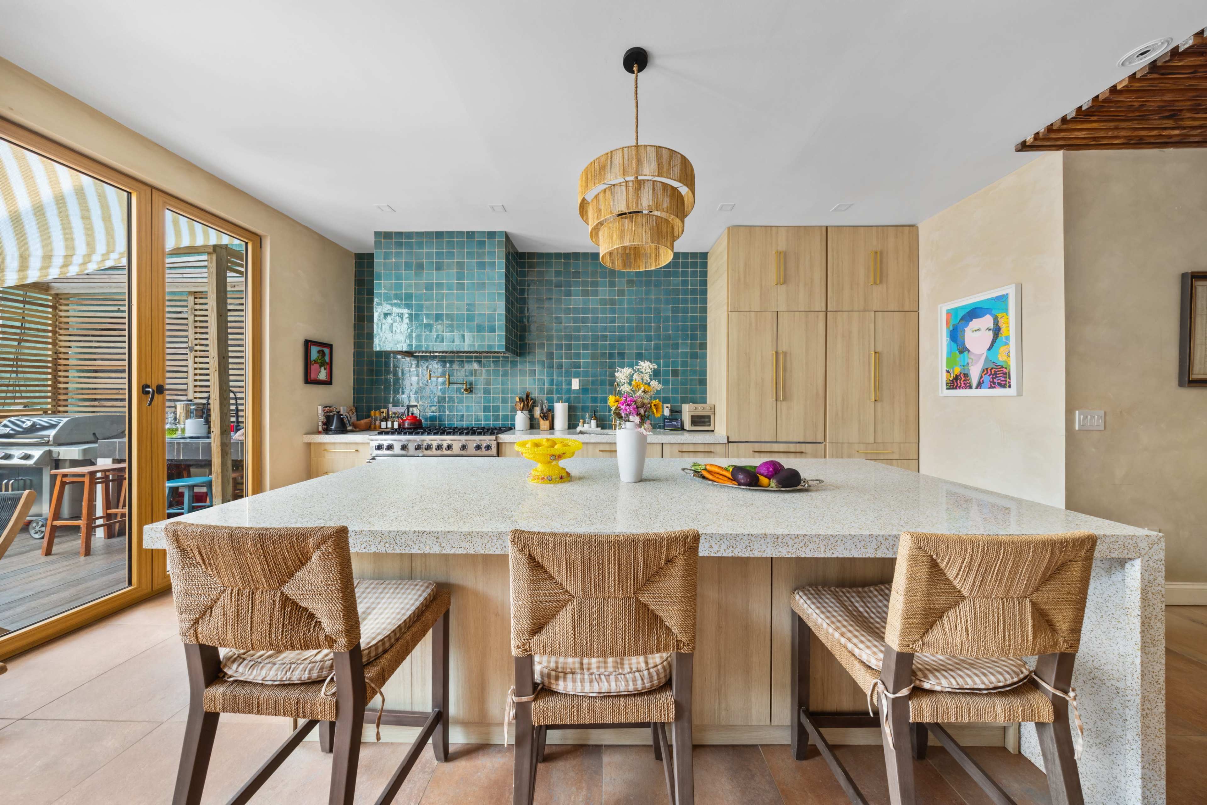 Mediterranean Townhouse with Chic Backyard Image in Ridgewood, Queens, NY