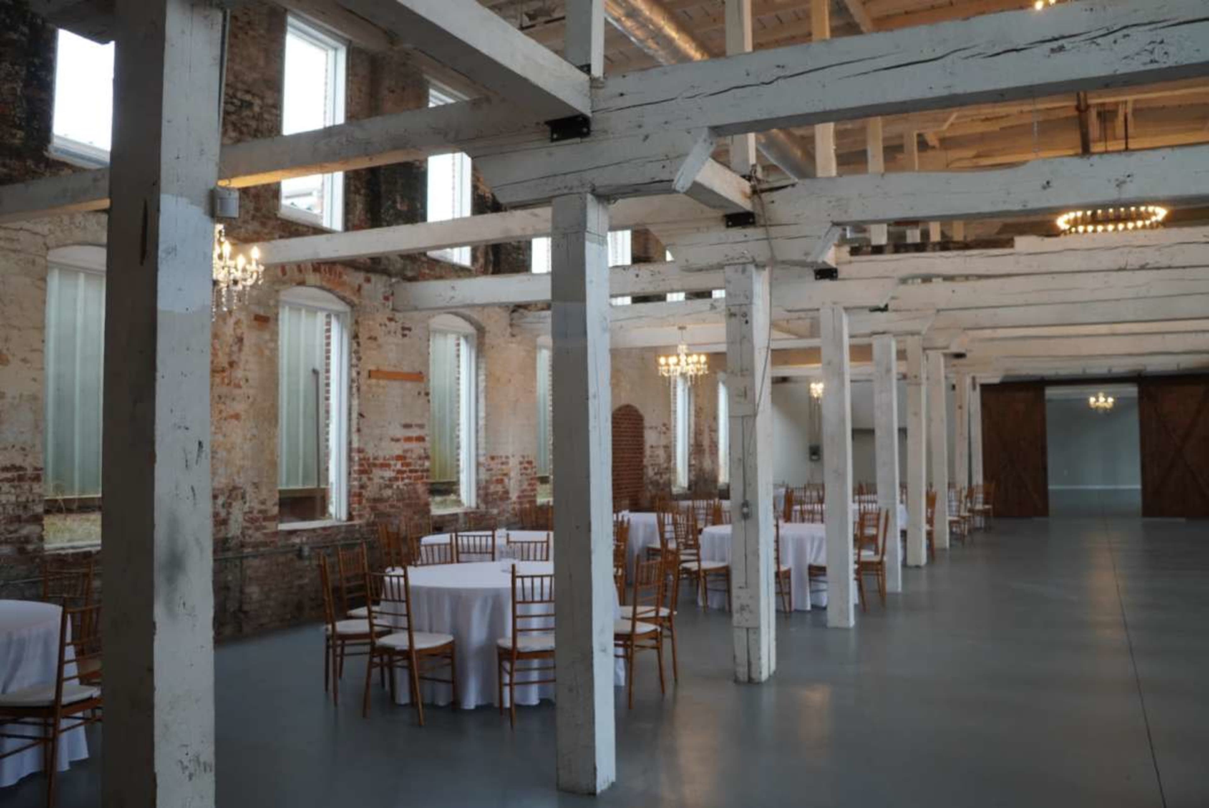 Historic Downtown Space with Exposed Brick and White Beams Image in Buford, Buford, GA