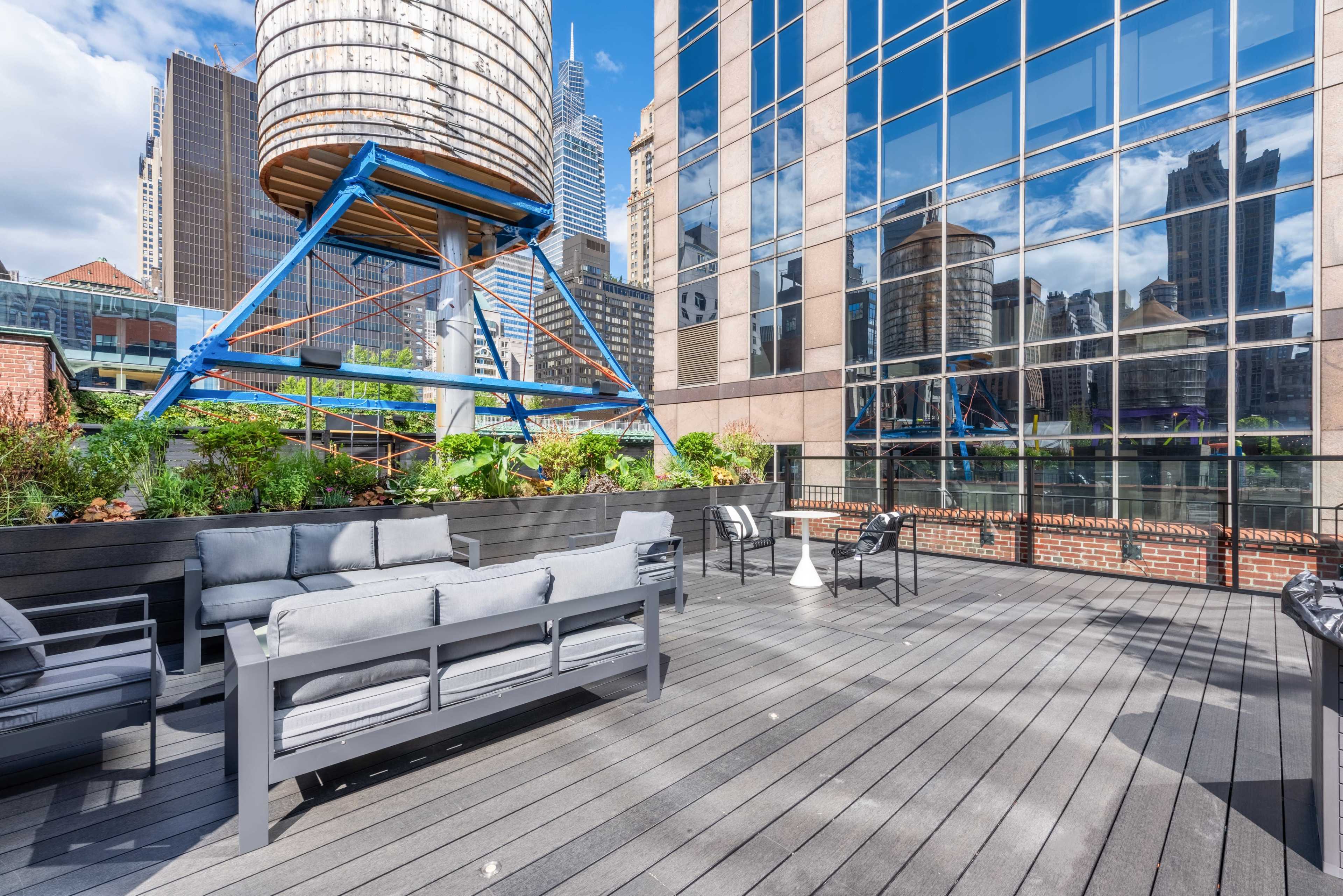 Midtown Rooftop Venue facing the Empire State Buidling – Amazing Views, Music & Furniture Included Image in Midtown Manhattan, new york, NY