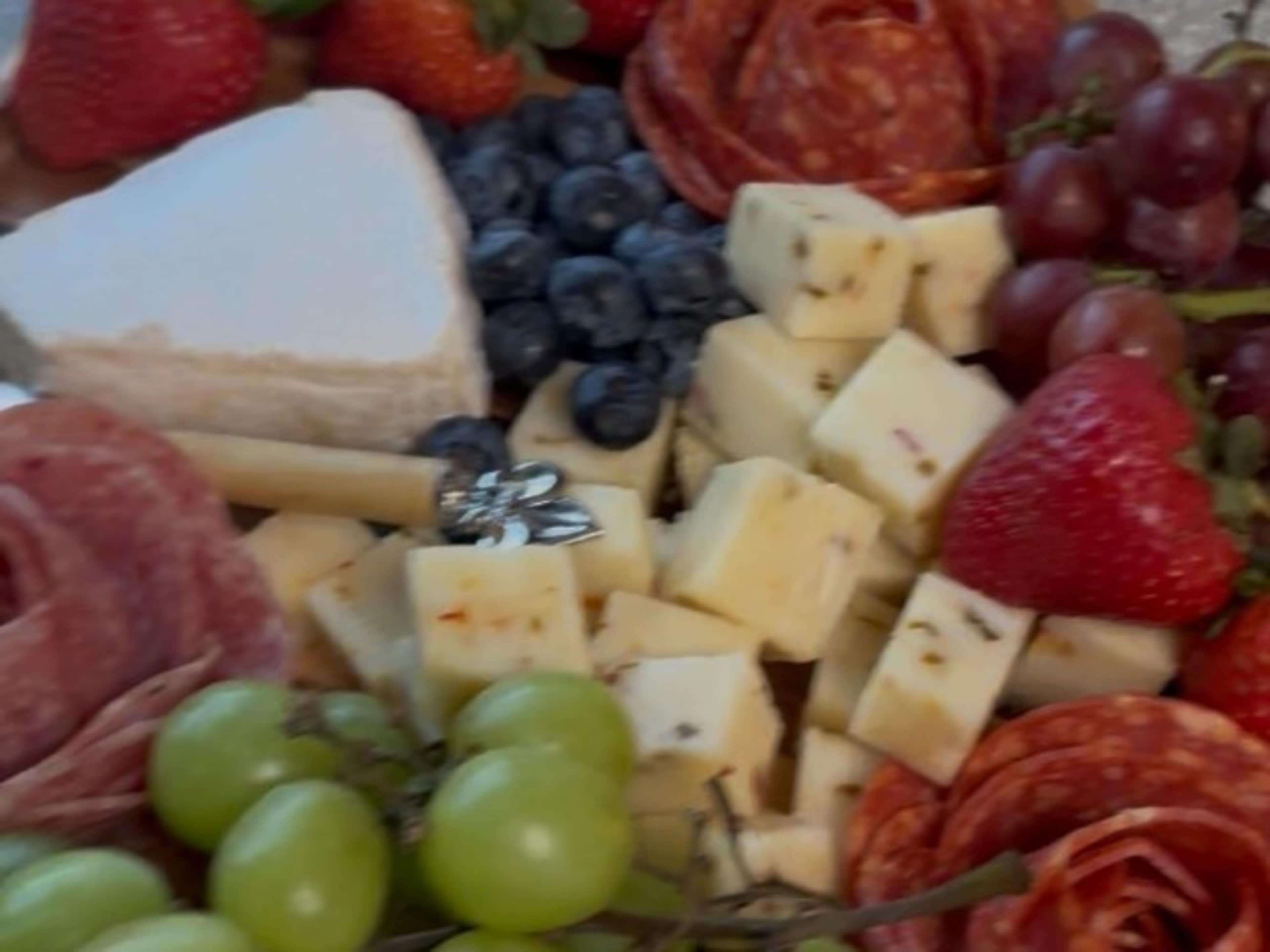 Charcuterie snack board + sparkling cider 