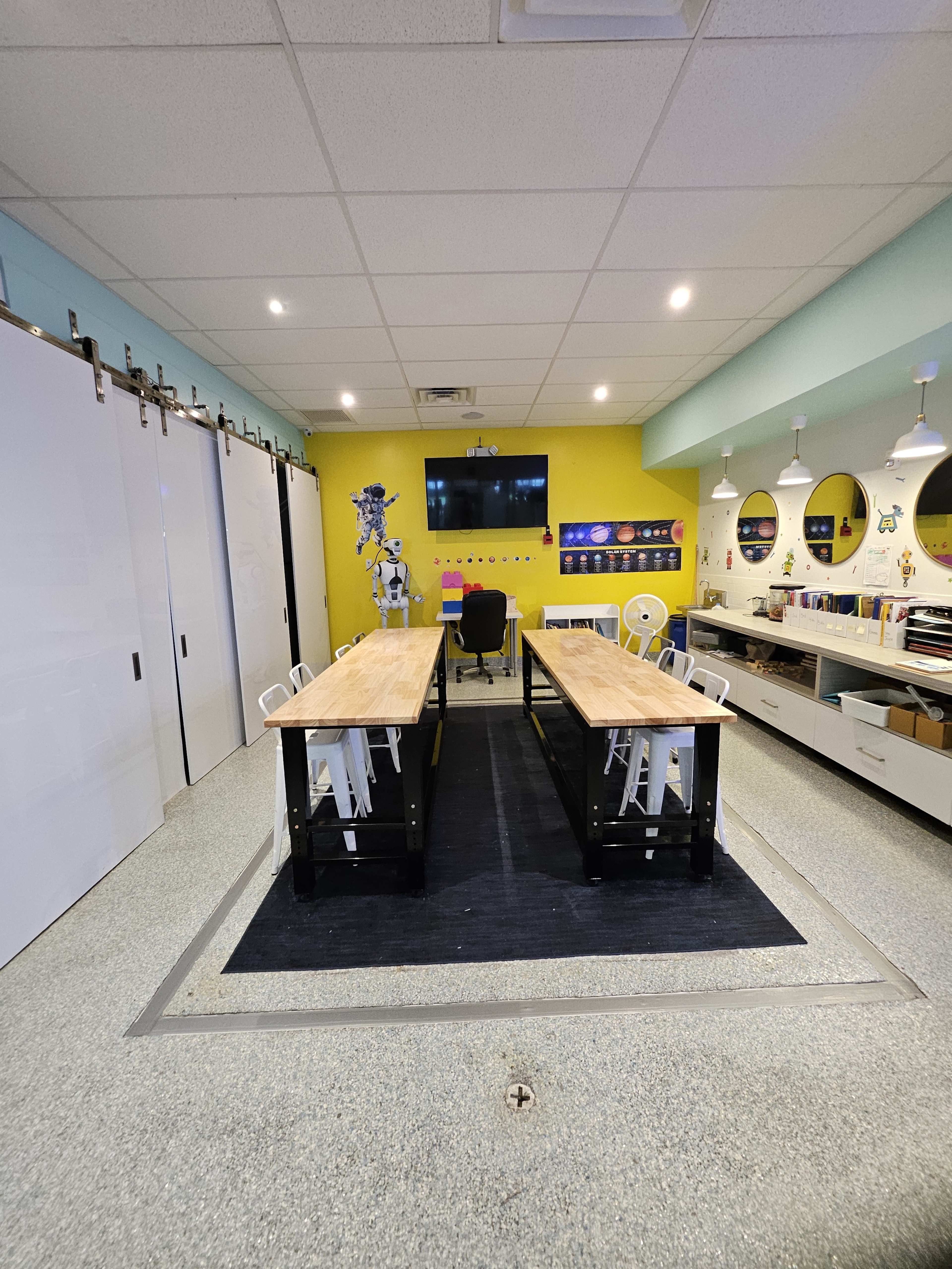 Bright STEM Room with 60" TV, Sink & Creative Energy — Perfect for Classes, Workshops, or Kids’ Learning Events Image in University Drive, Coral Springs, FL