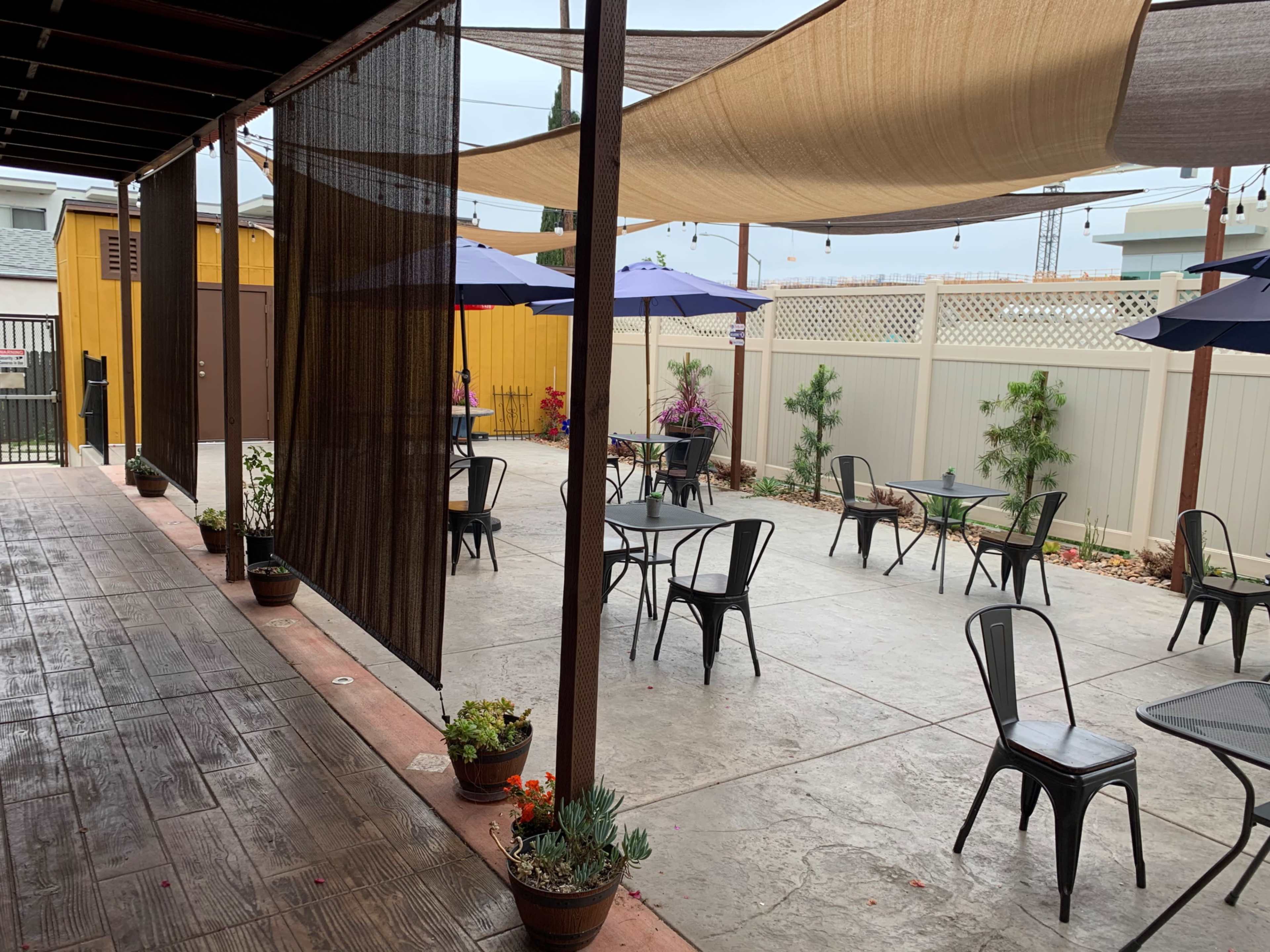 Secluded and Peaceful rustic patio in the back of the Restaurant Image in Kensington, San Diego, CA