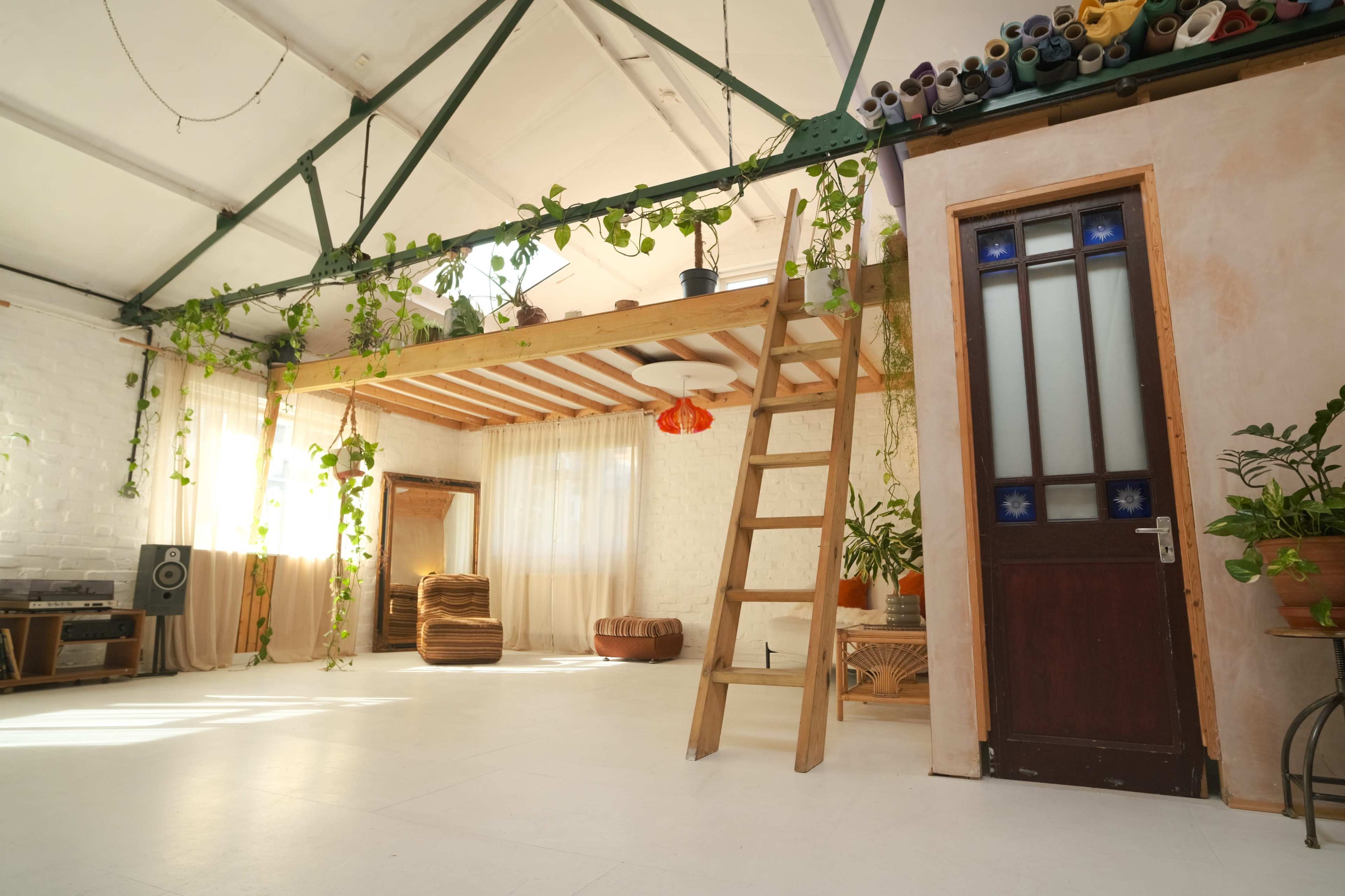 Warehouse Daylight Photography Studio with Large Raw Plaster Walls with lots of plants & props Image in Lower Clapton, London, ENG