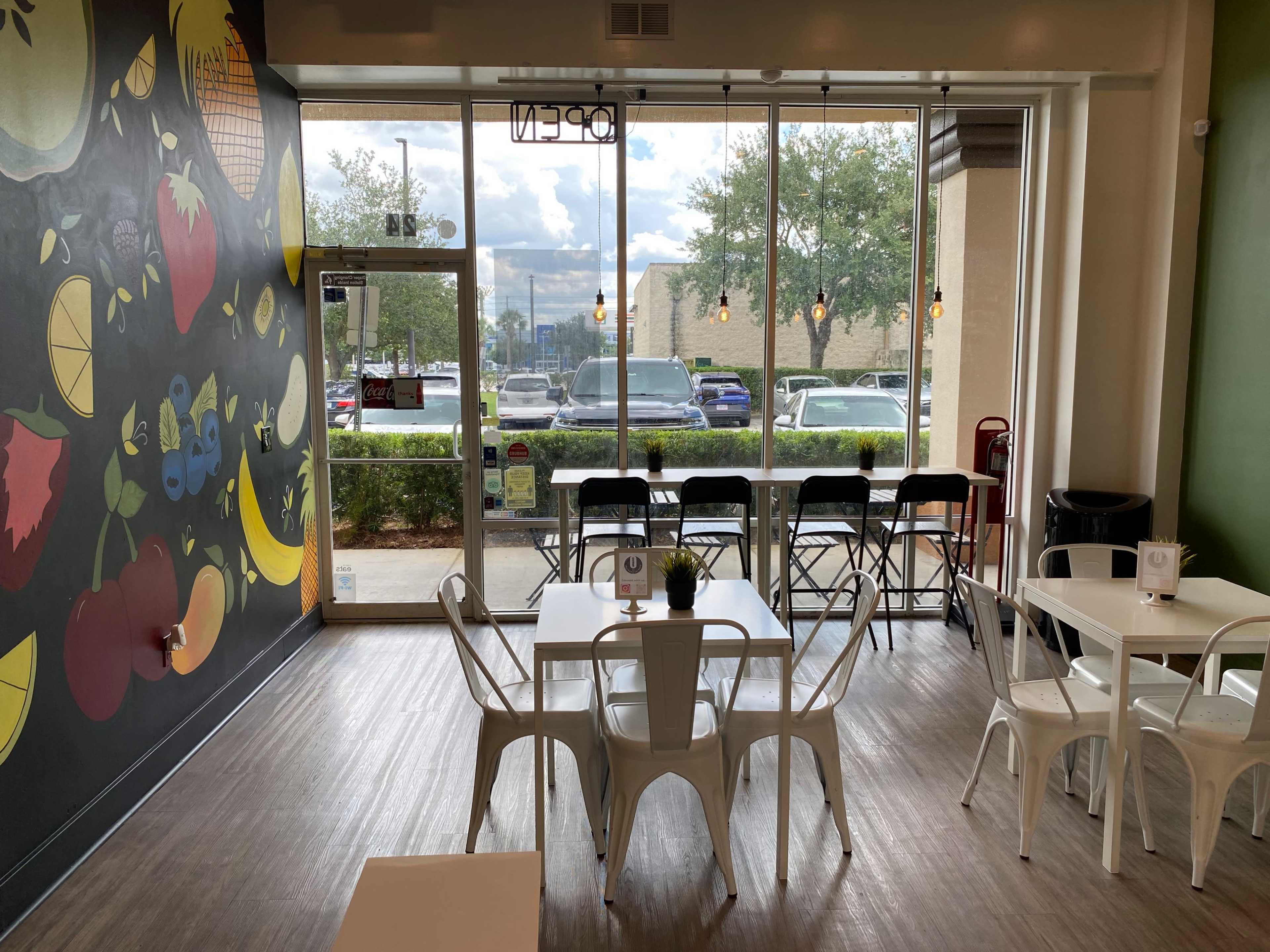 An Ice Cream space with tables, chairs, super Clean restrooms and free wifi. Image in Deerfield Village, Orlando, FL