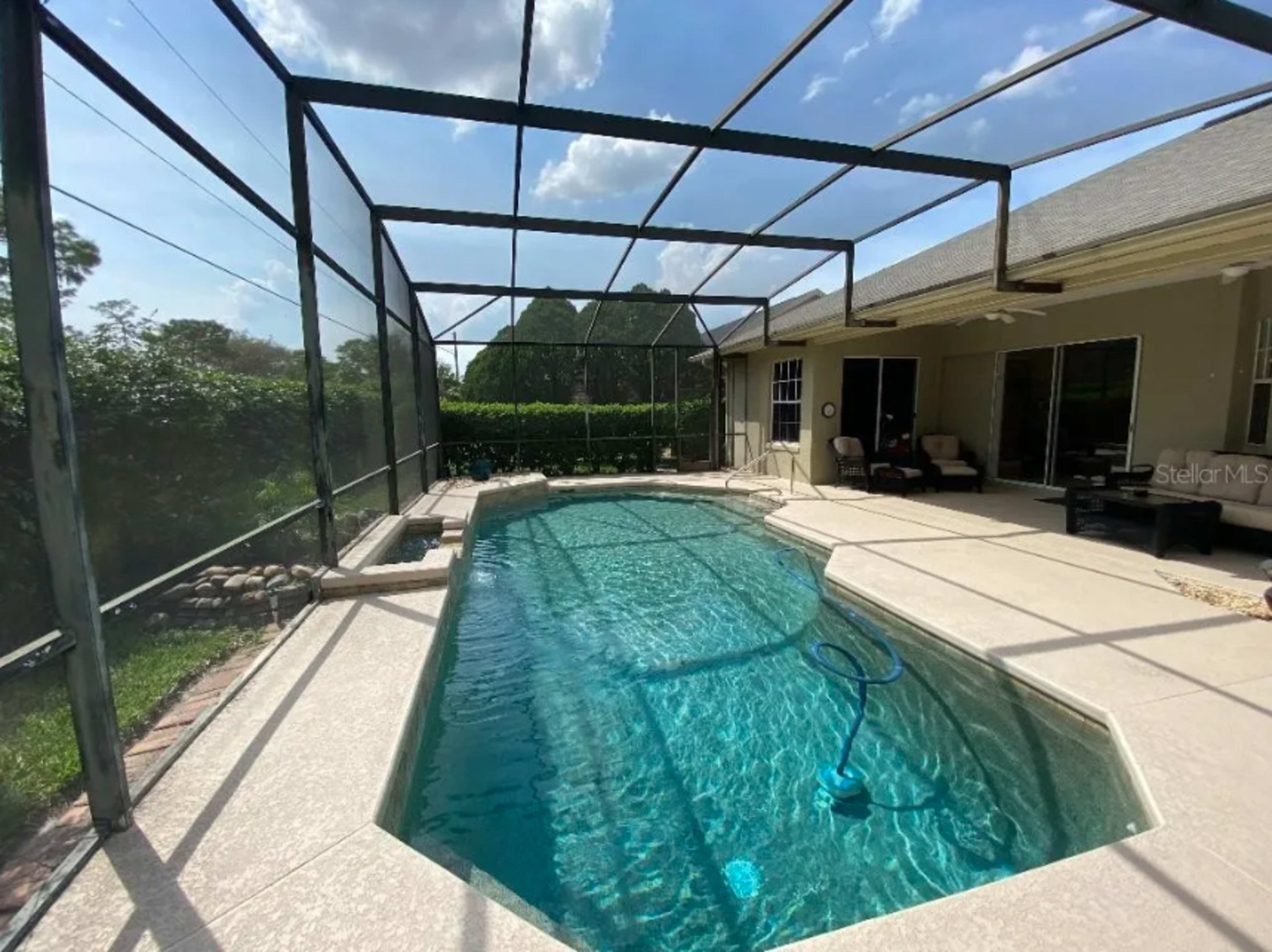 Cozy house in a quiet neighborhood with open space, pool and garden Image in , OVIEDO, FL