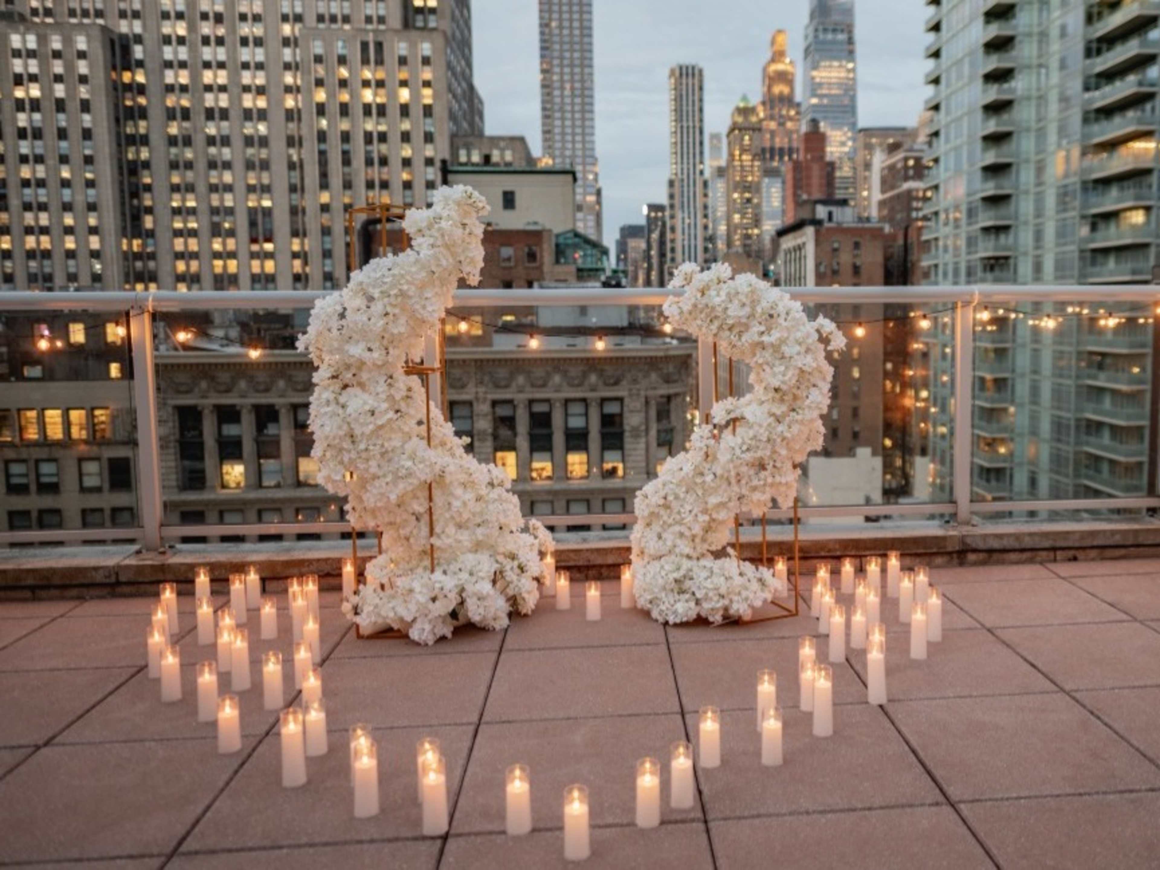 Silk flowers asymmetrical arch