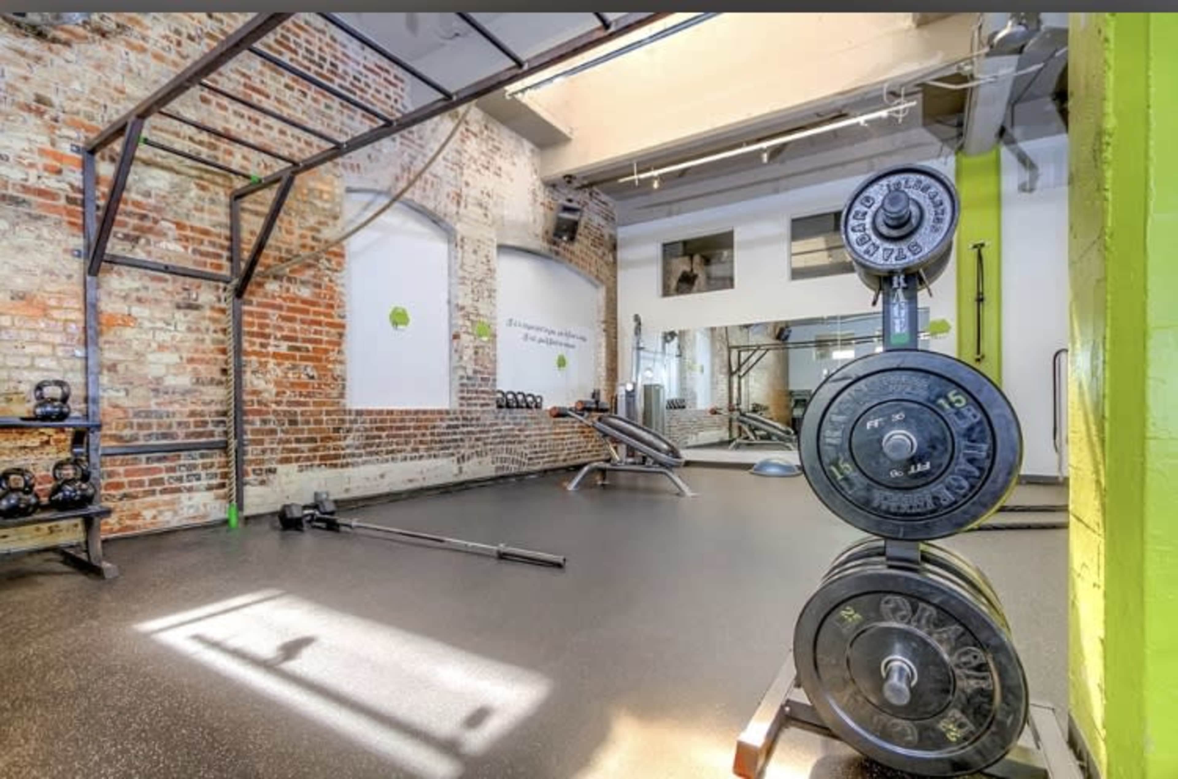 Urban Fitness Studio with Exposed Brick and Natural Lighting Image in Five Points, Denver, CO