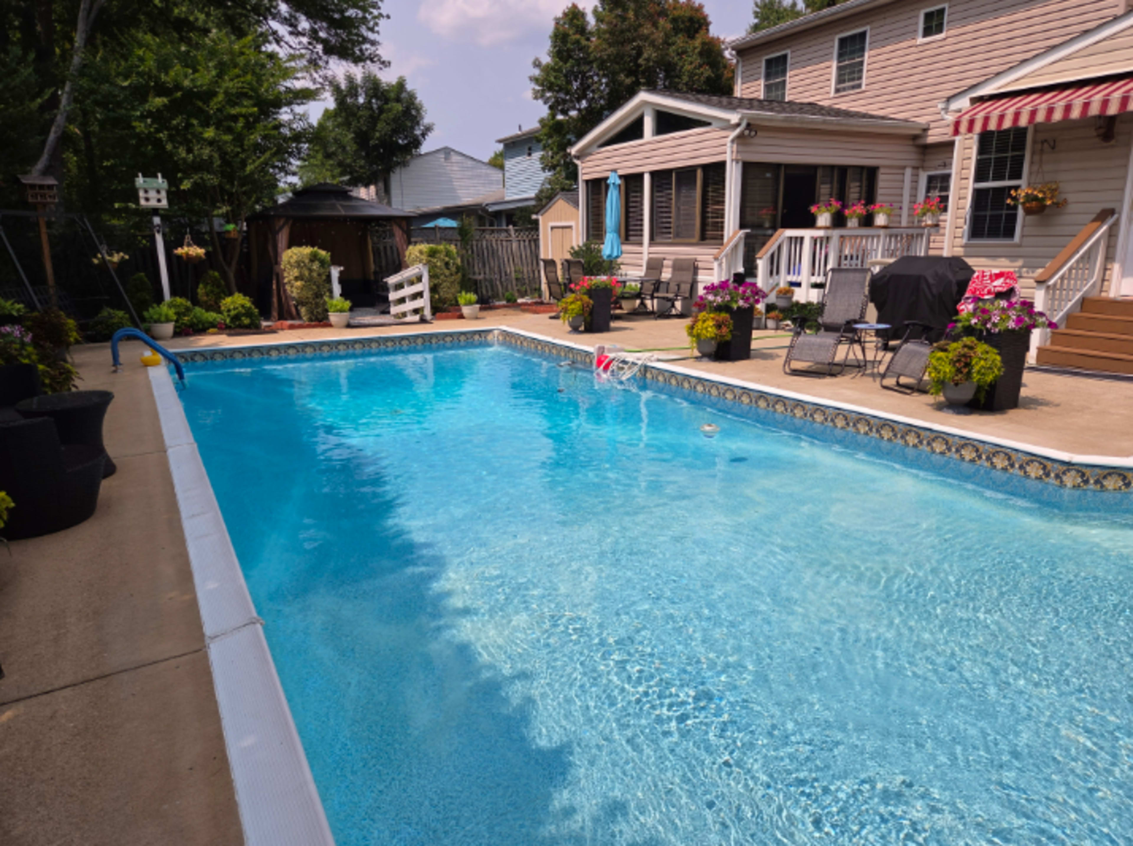 Beautifully landscaped pool and back yard with gazebo Image in Woodlawn, ALEXANDRIA, VA