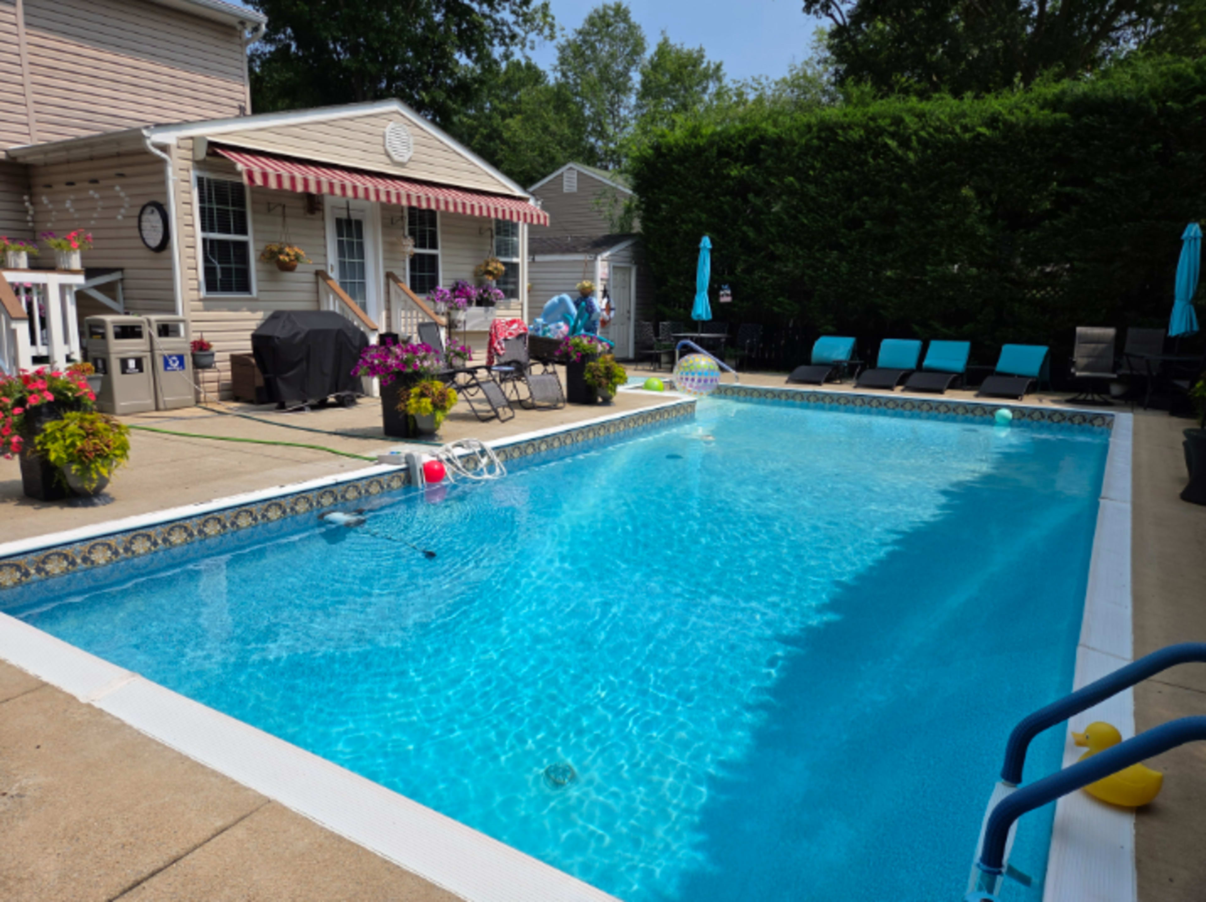 Beautifully landscaped pool and back yard with gazebo Image in Woodlawn, ALEXANDRIA, VA