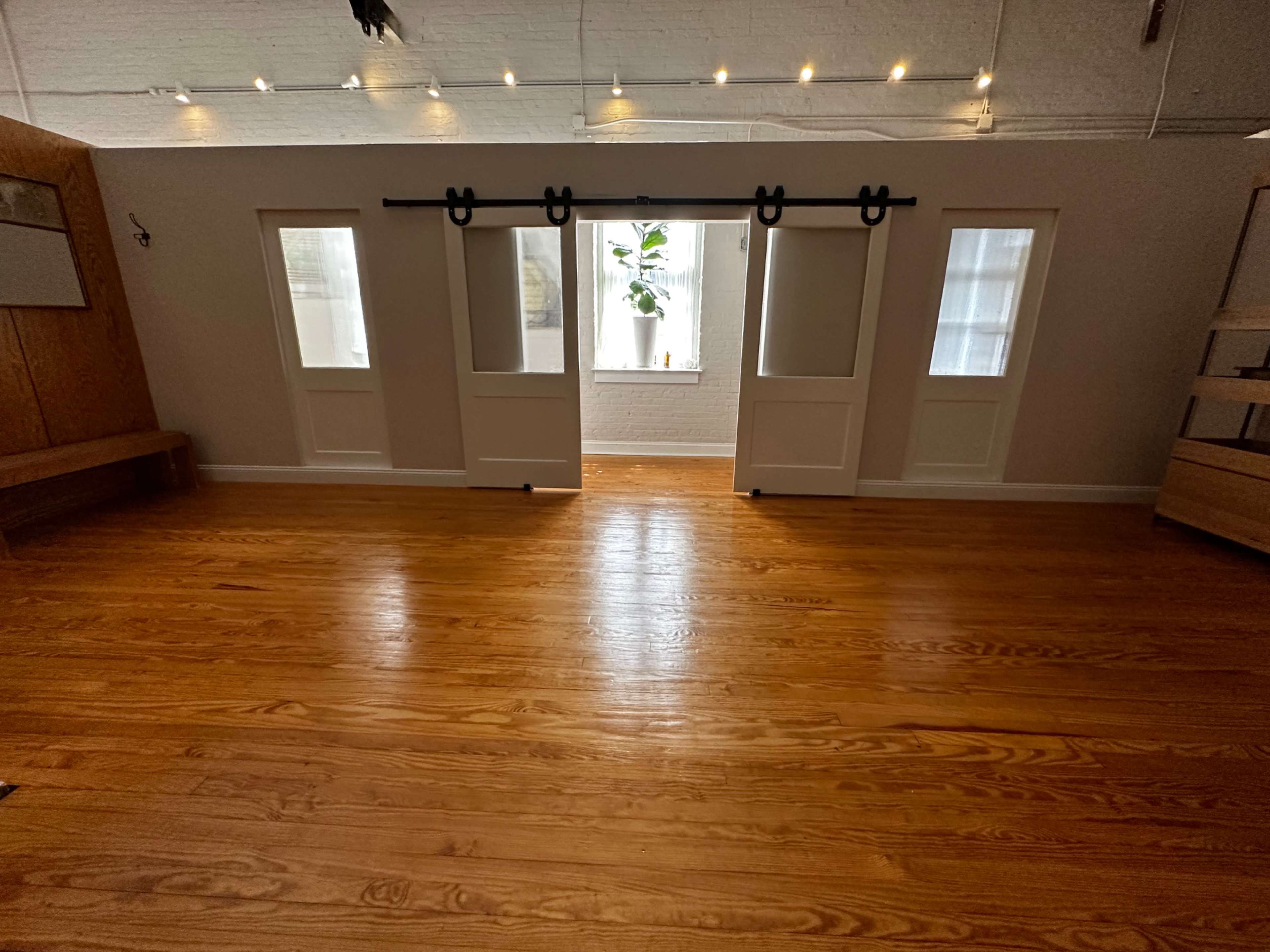 A stunningly warm & light filled industrial space in a novel location. Image in Hampden, Baltimore, MD