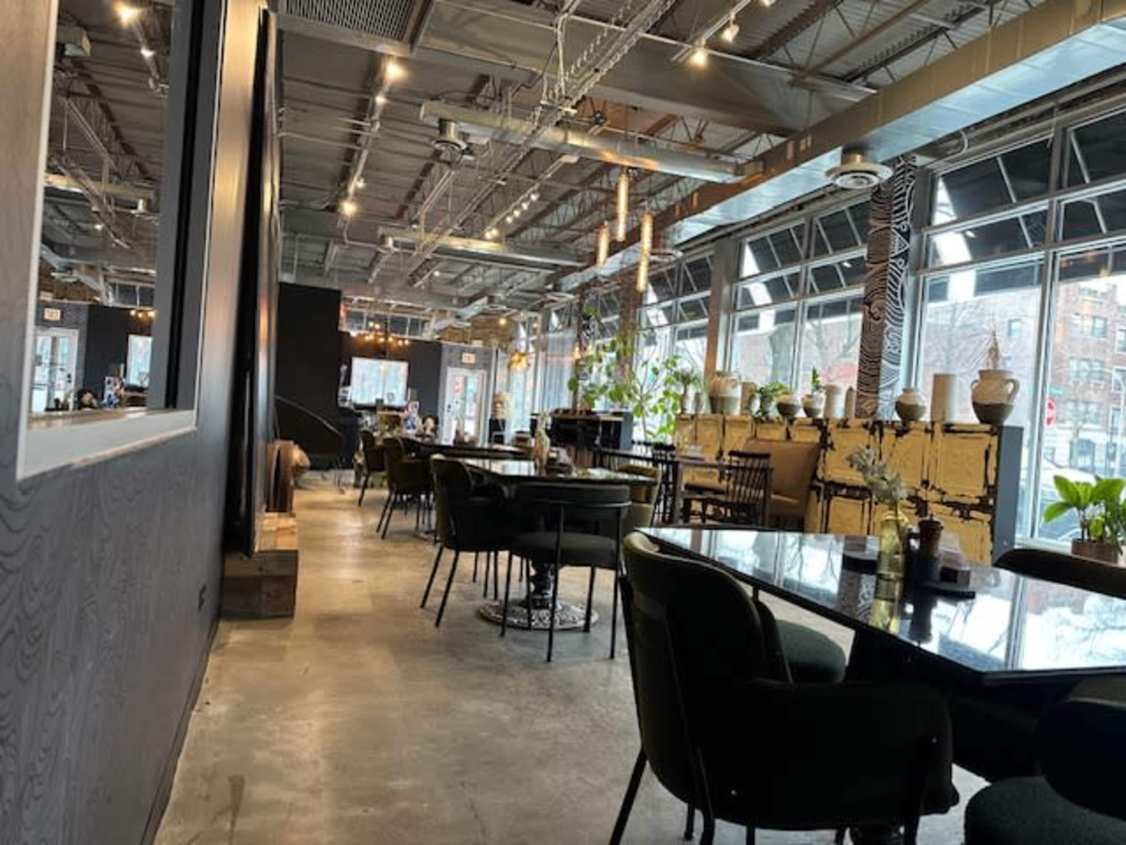 Modern and furnished event space with natural light Image in Kenwood, chicago, IL